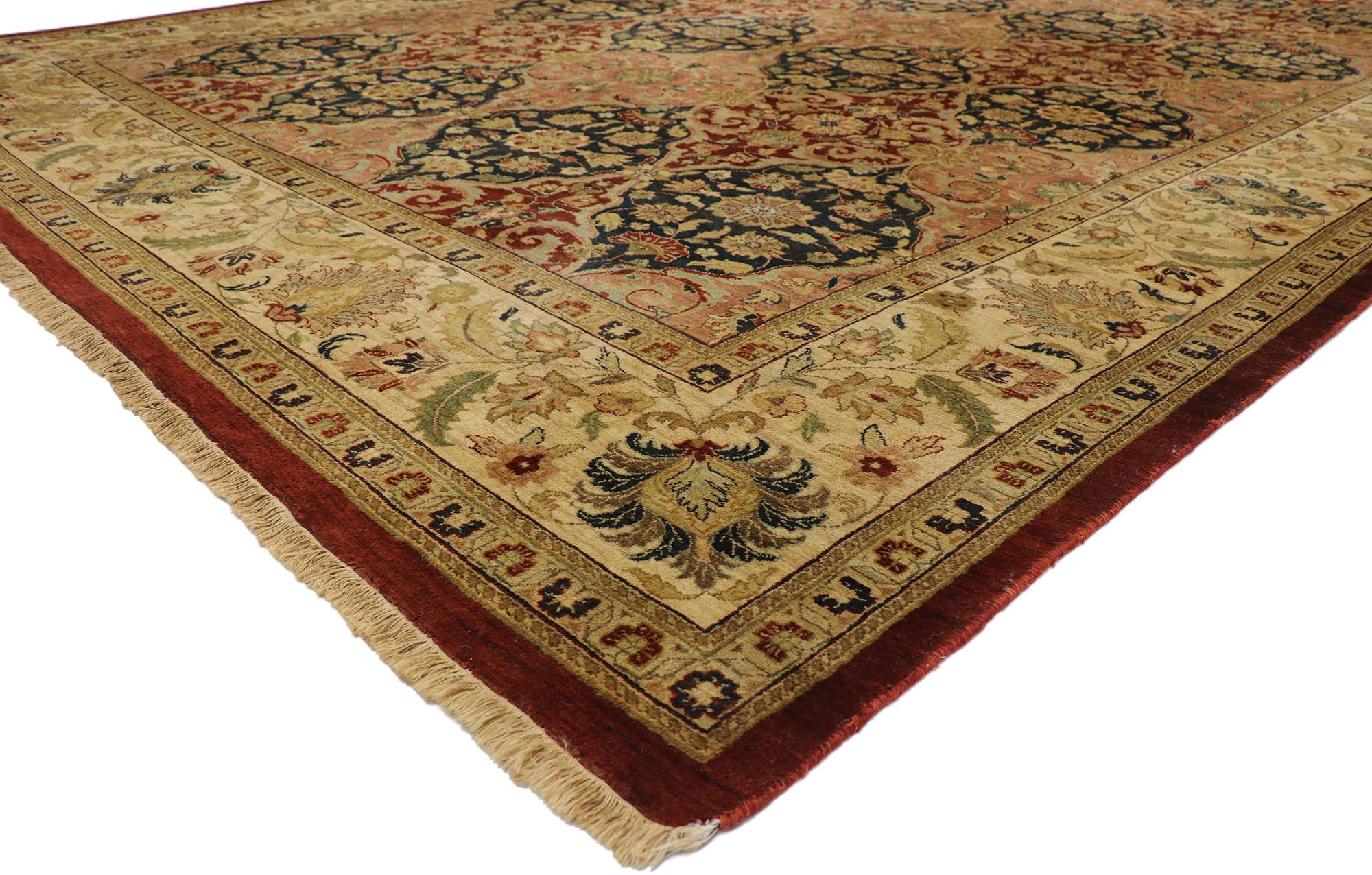 77612 Vintage Indian Palace rug with Old World Baroque style. Displaying a timeless design with well-balanced symmetry, this hand knotted wool vintage Indian palace rug astounds with its beauty. The abrashed field an all-over botanical compartment