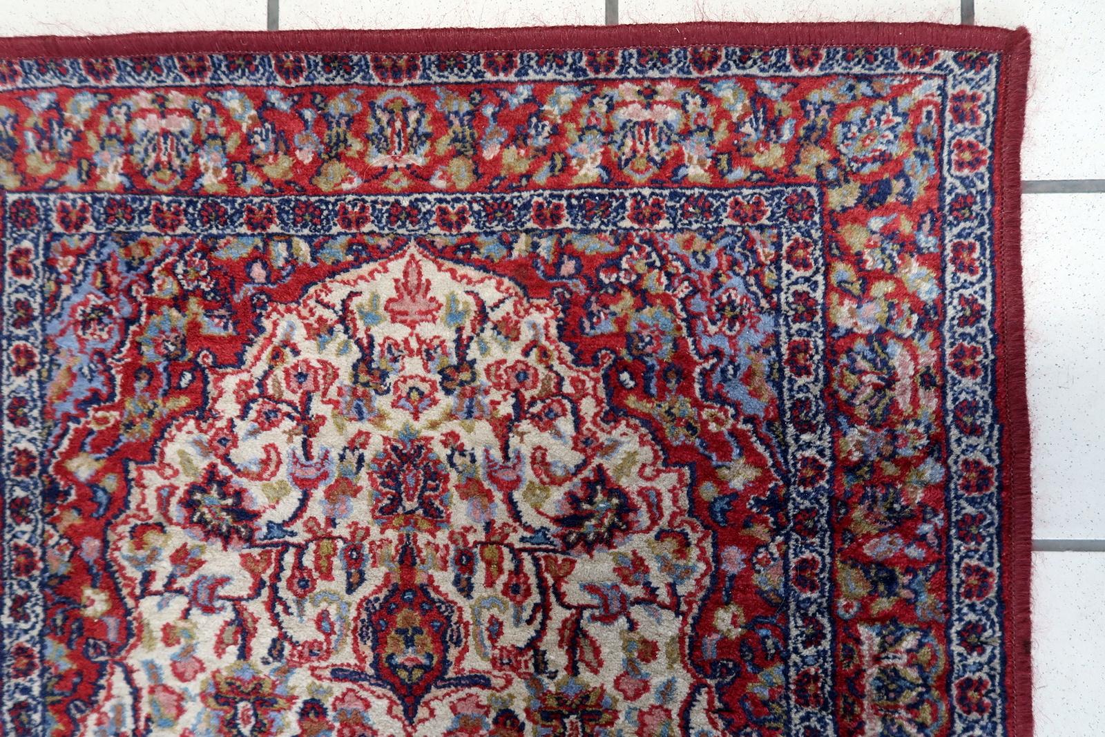 Vintage Indian Rug:

Dimensions: This meticulously crafted rug measures 2.1’ x 3.9’ (67cm x 120cm), making it suitable for smaller spaces or as an accent piece.
Craftsmanship: Originating from the 1970s, this rug showcases the artistry of Indian