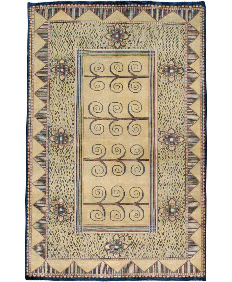 A vintage Indian Art Deco style carpet from the mid-20th century.