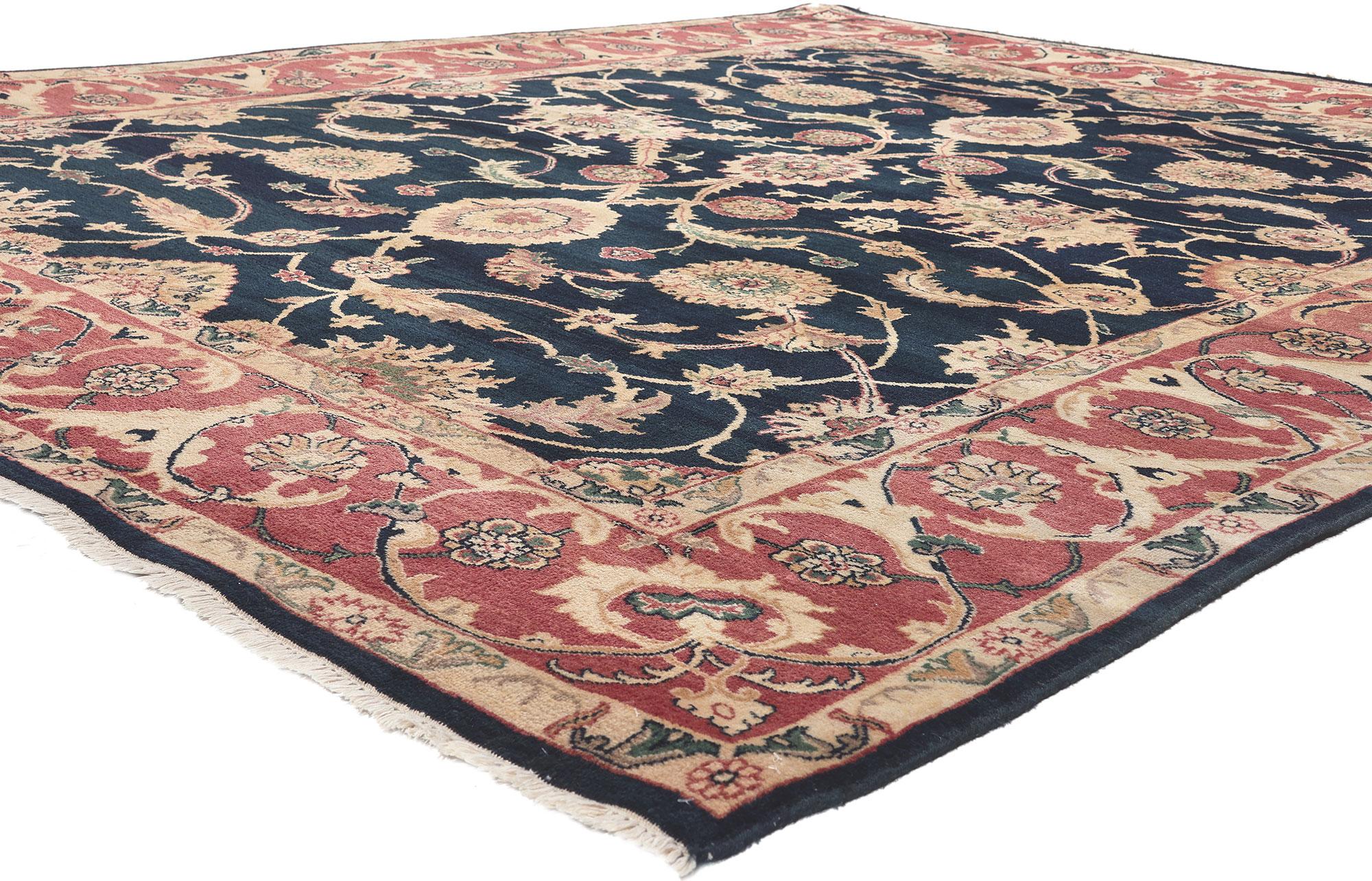 78649 Vintage Indian Rug, 07'11 x 10'01.
​Timeless appeal meets nostalgic charm in this hand knotted wool vintage Indian rug. The intricate botanical design and lively earth-tone colors woven into this piece work together creating an inimitable