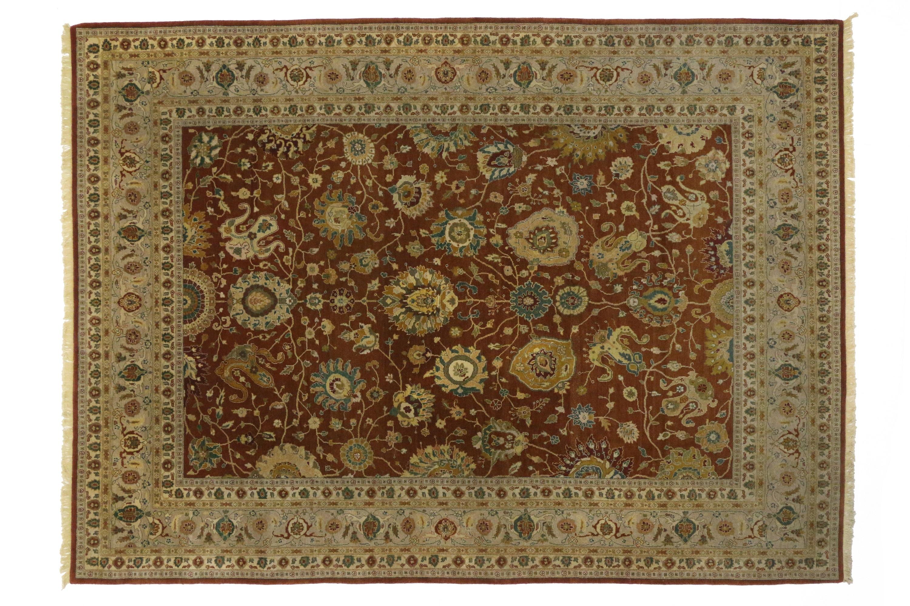 76709, vintage Indian rug with traditional style and all-over floral design. This opulent traditional style rug features a warm spice colored field blooming with lush, intricate palmettes in saffron, muted teal, sand, creamy-beige and mocha.