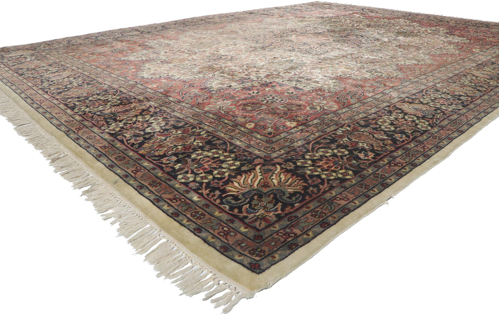 78227 vintage Indian rug 09'03 x 12'07. Rendered in variegated shades of rosewood, brick red, beige, berry, navy blue, mauve, tan, glaucous, sage, brown, rose, coffee, cerulean, verdigris, and sky blue with other accent colors. Desirable age wear.