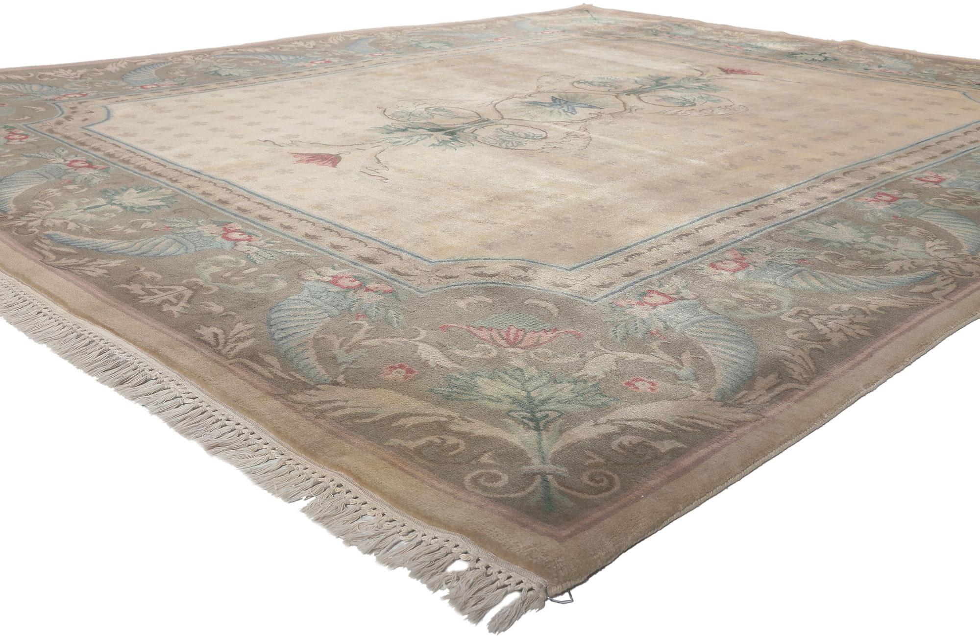 74753 Vintage Indian Savonnerie Rug, 08'02 x 10'00.
European charm meets French Country style in this hand knotted wool vintage Indian Savonnerie rug. The intricate design and soft earthy colors woven into this piece work together creating a refined