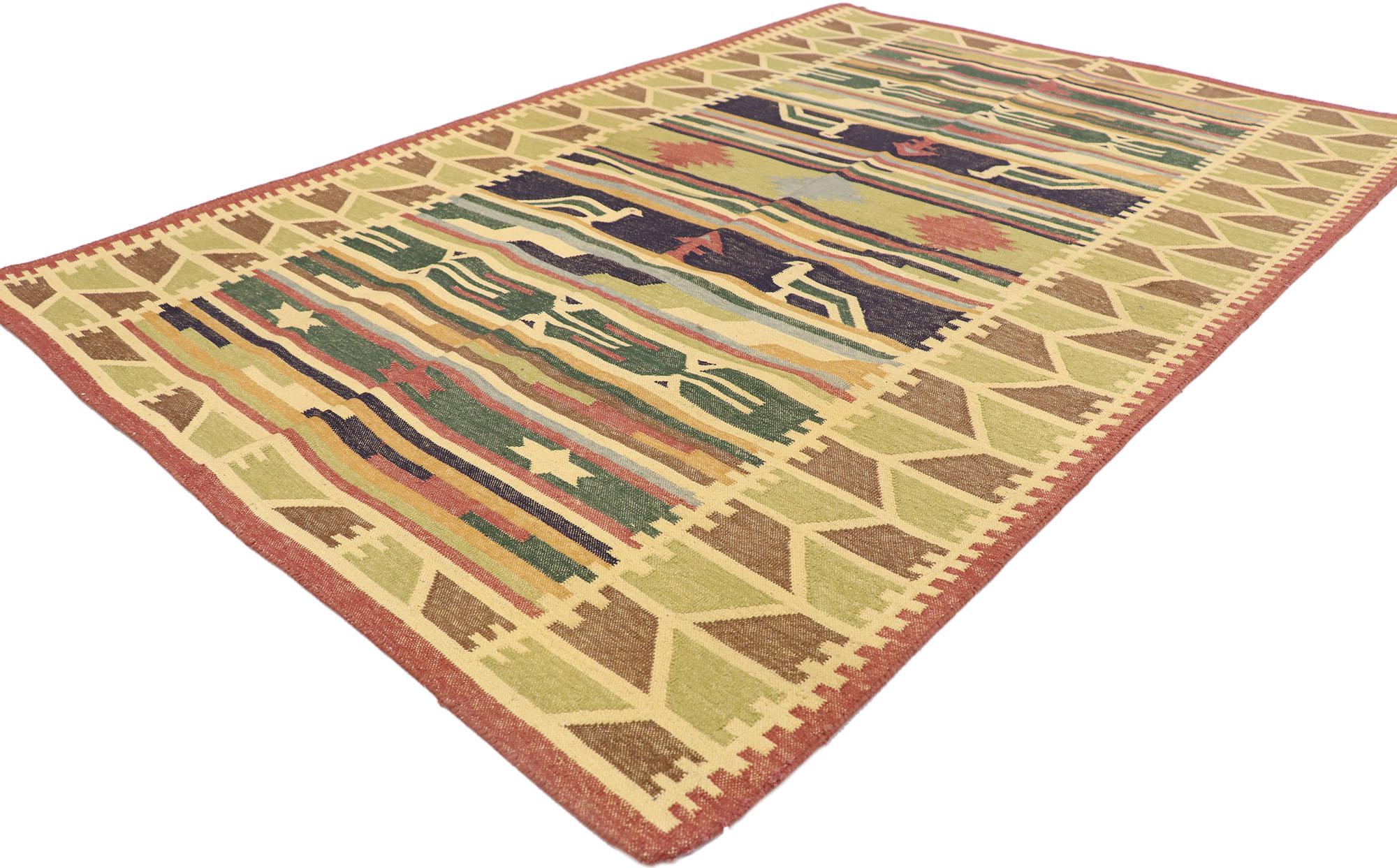77989 Vintage Indian Stone Wash Dhurrie Rug with Folk Art Tribal Style 03'10 x 05'09. Full of tiny details and a bold expressive design combined with with warm earth-tone colors and folk art tribal style, this hand-woven wool vintage Indian stone