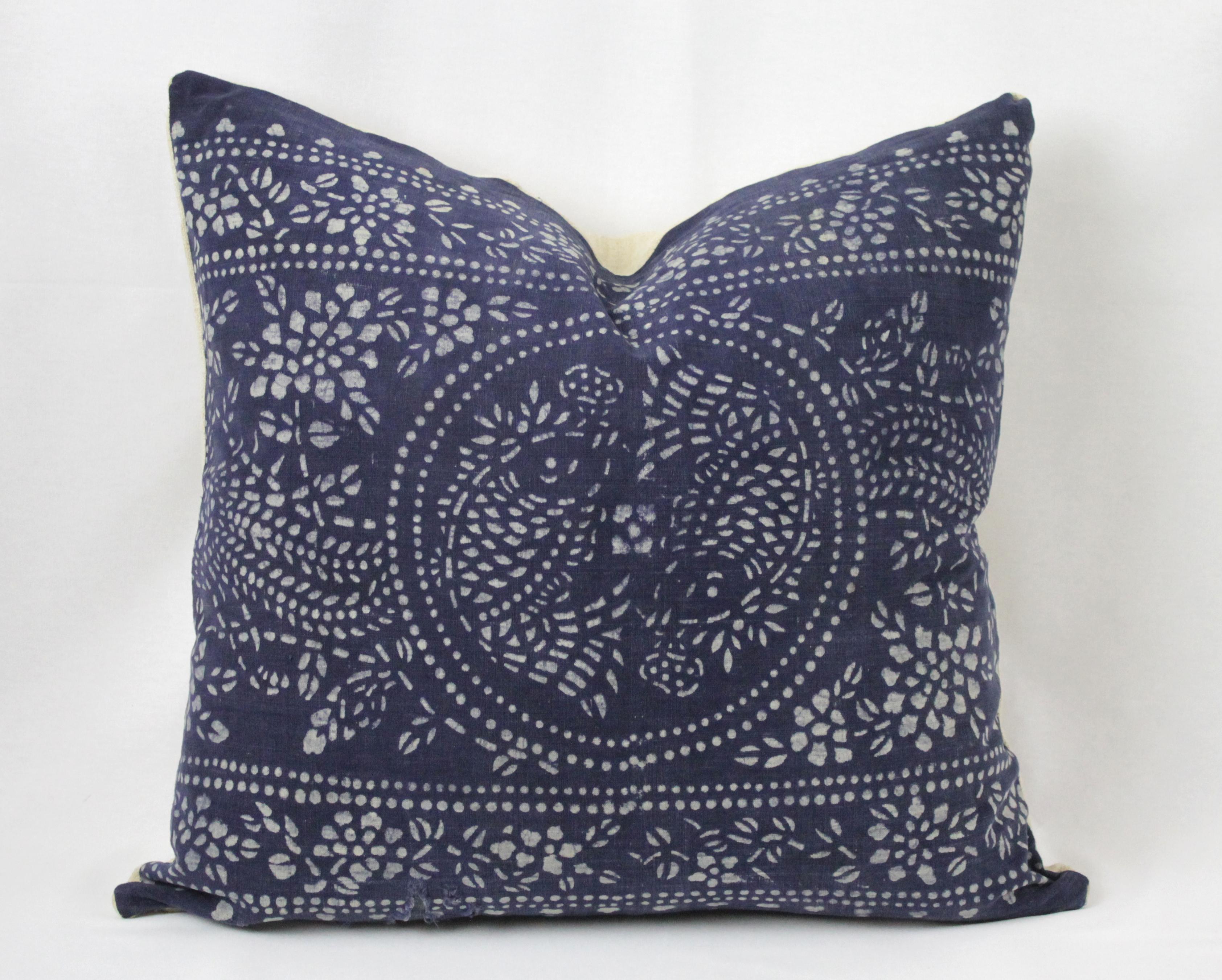 Beautiful vintage indigo dotted printed pillow. Back is in antique French grain sack linen. Main color is indigo with off-white dots that create a pattern. Pillow has minor tear on the bottom left that is stitched around and a patch on the back