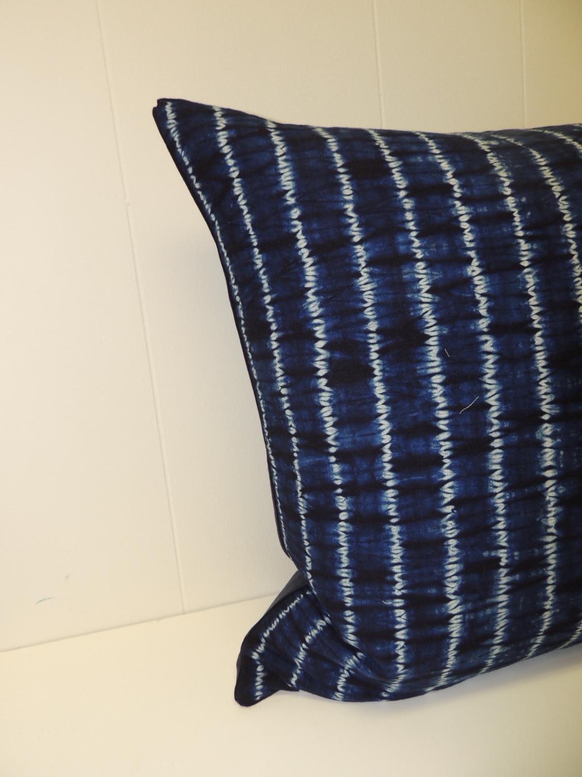 Vintage Indigo and White African Resist-dye Textile Decorative Pillow
Square pillow with textured navy blue backing and small dark blue 
decorative trim all around made from the same vintage textile.
Decorative pillows handmade and designed in the