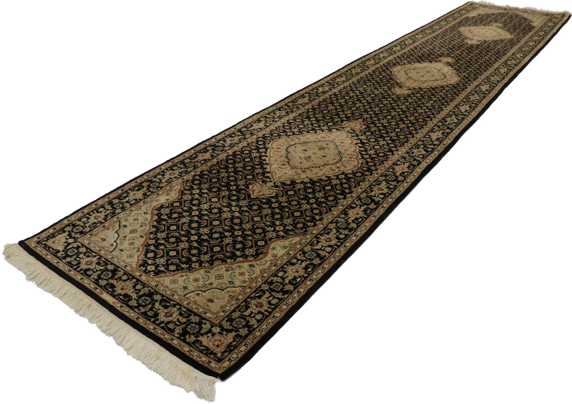 77545 Vintage Persian Tabriz Style Indian Runner 03'00 x 15'00. This hand knotted wool vintage Persian style runner features three scalloped diamond-shaped medallions with palmette pendants floating on an abrashed field. The medallions, field, and