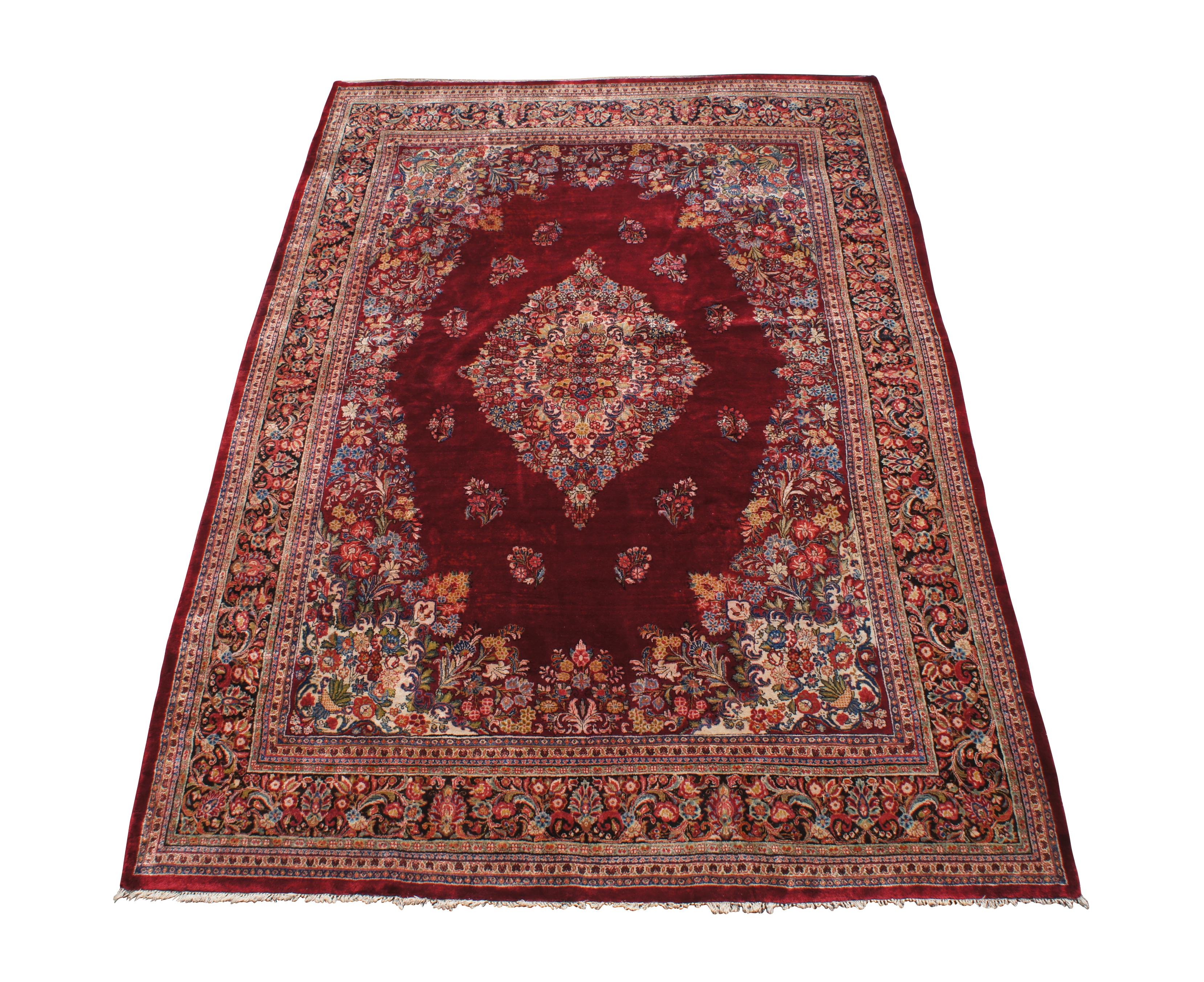 Indo-Tabriz area rugs are hand-knotted rugs with traditional designs and rich color palettes. They are known for their quality, durability, and diverse patterns. This stunning carpet was handmade in India from silk and wool with a vibrant medallion