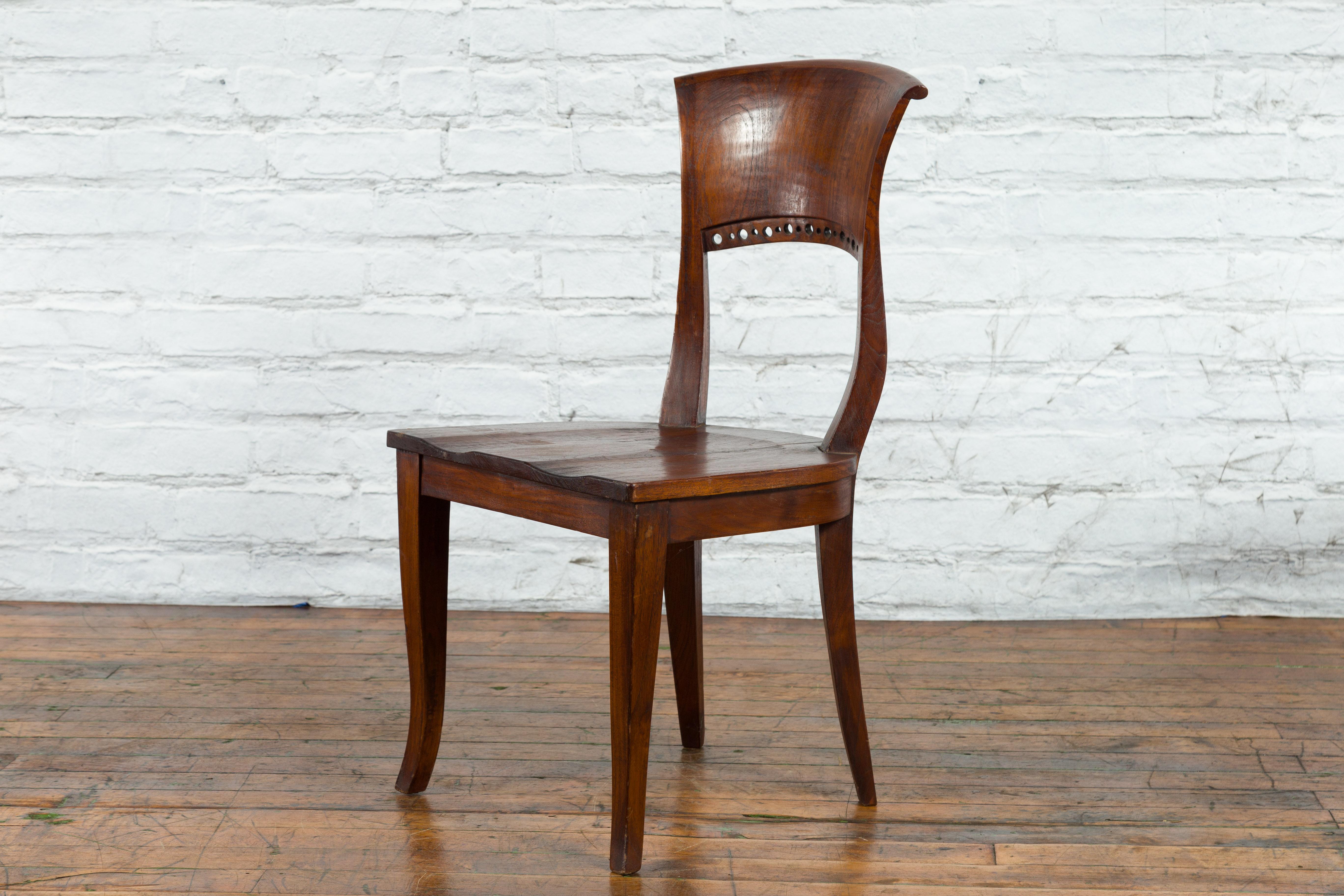 Vintage Indonesia Wooden Accent Chair with Pierced Circular Motifs Curving Back For Sale 5