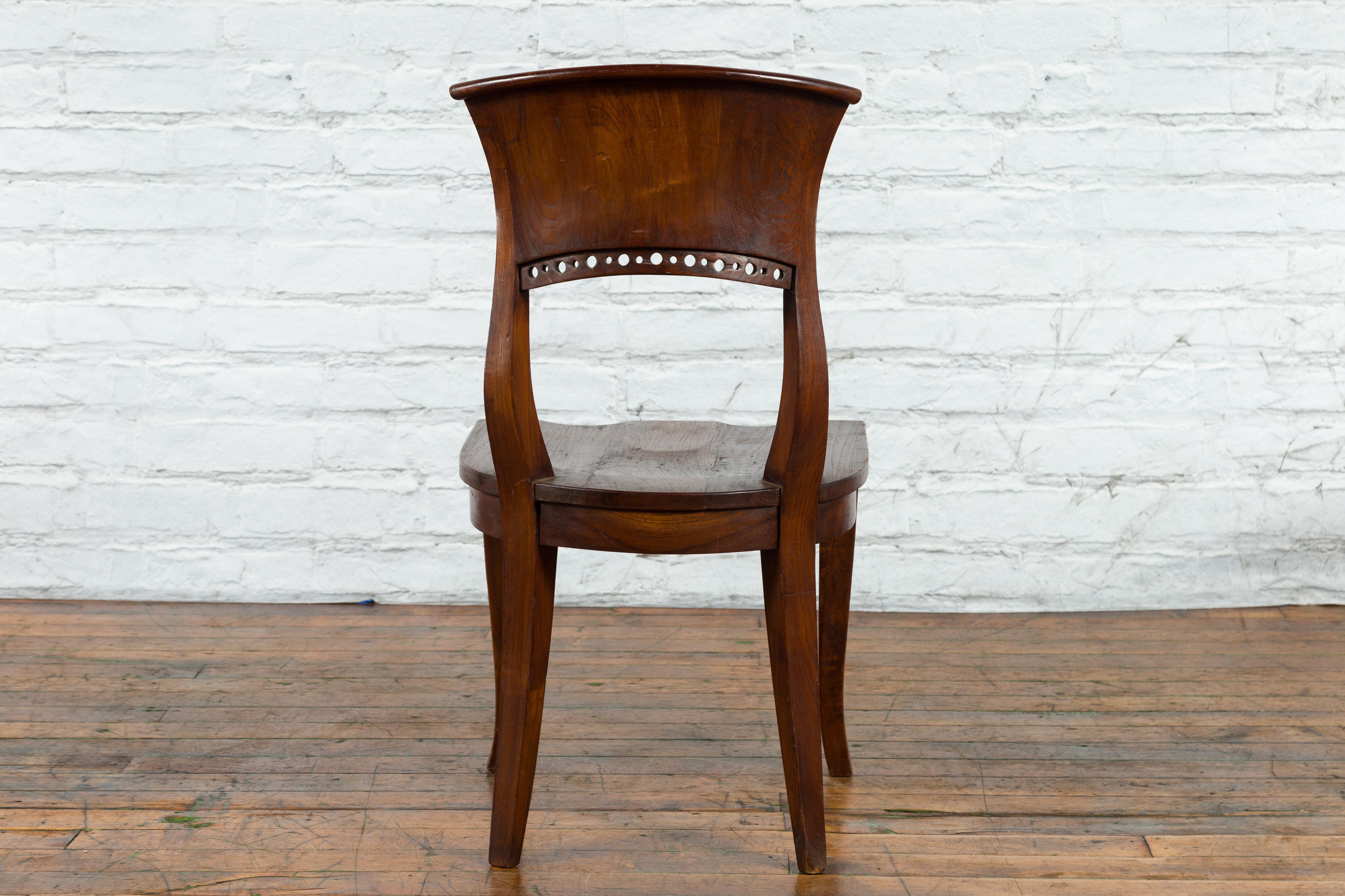 Vintage Indonesia Wooden Accent Chair with Pierced Circular Motifs Curving Back For Sale 2