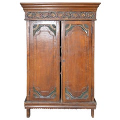 Vintage Indonesian Armoire with Polychrome Accents and Medallion Carved Frieze