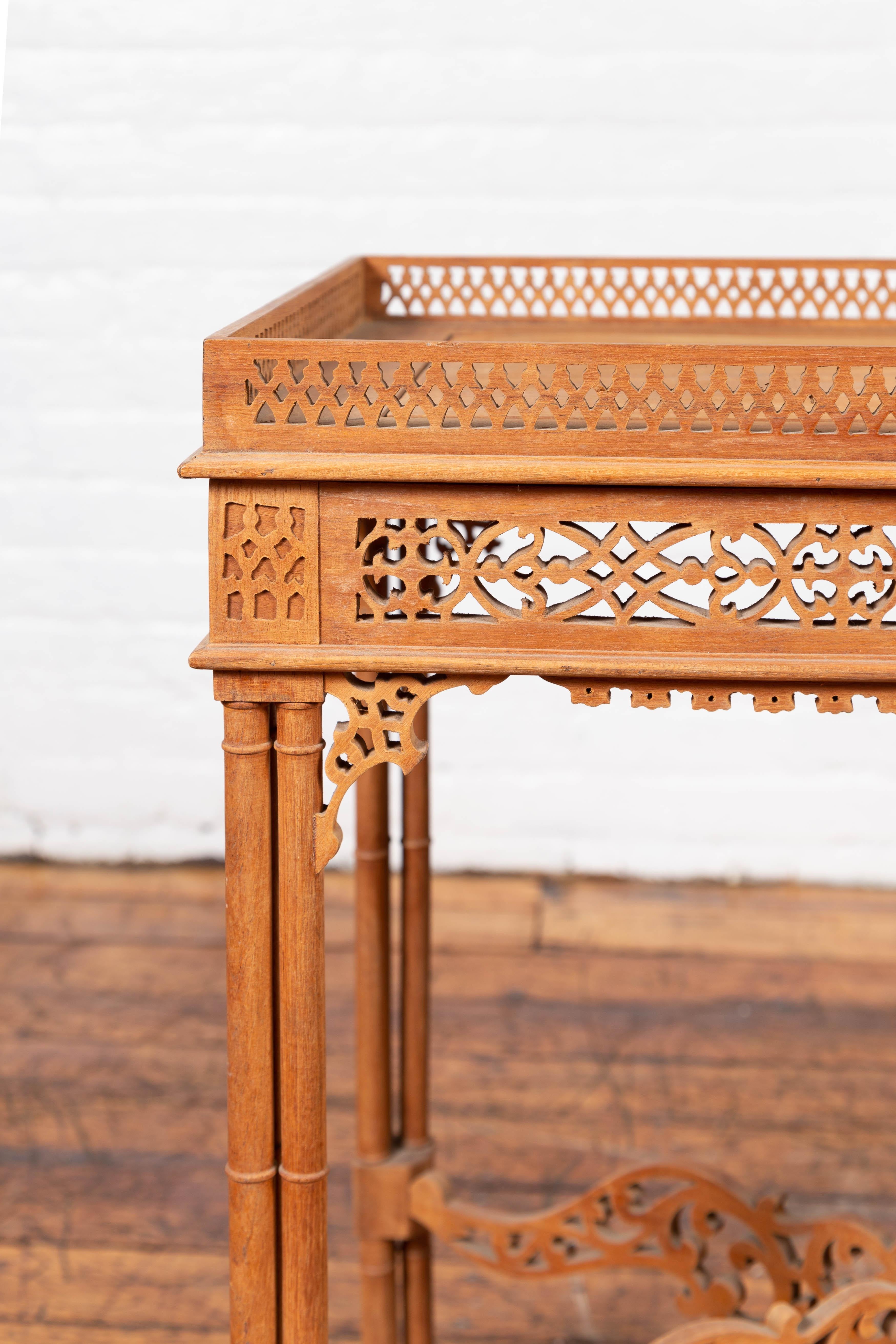 Vintage Indonesian Carved Side Table with Open Fretwork and Cross Stretcher In Good Condition In Yonkers, NY