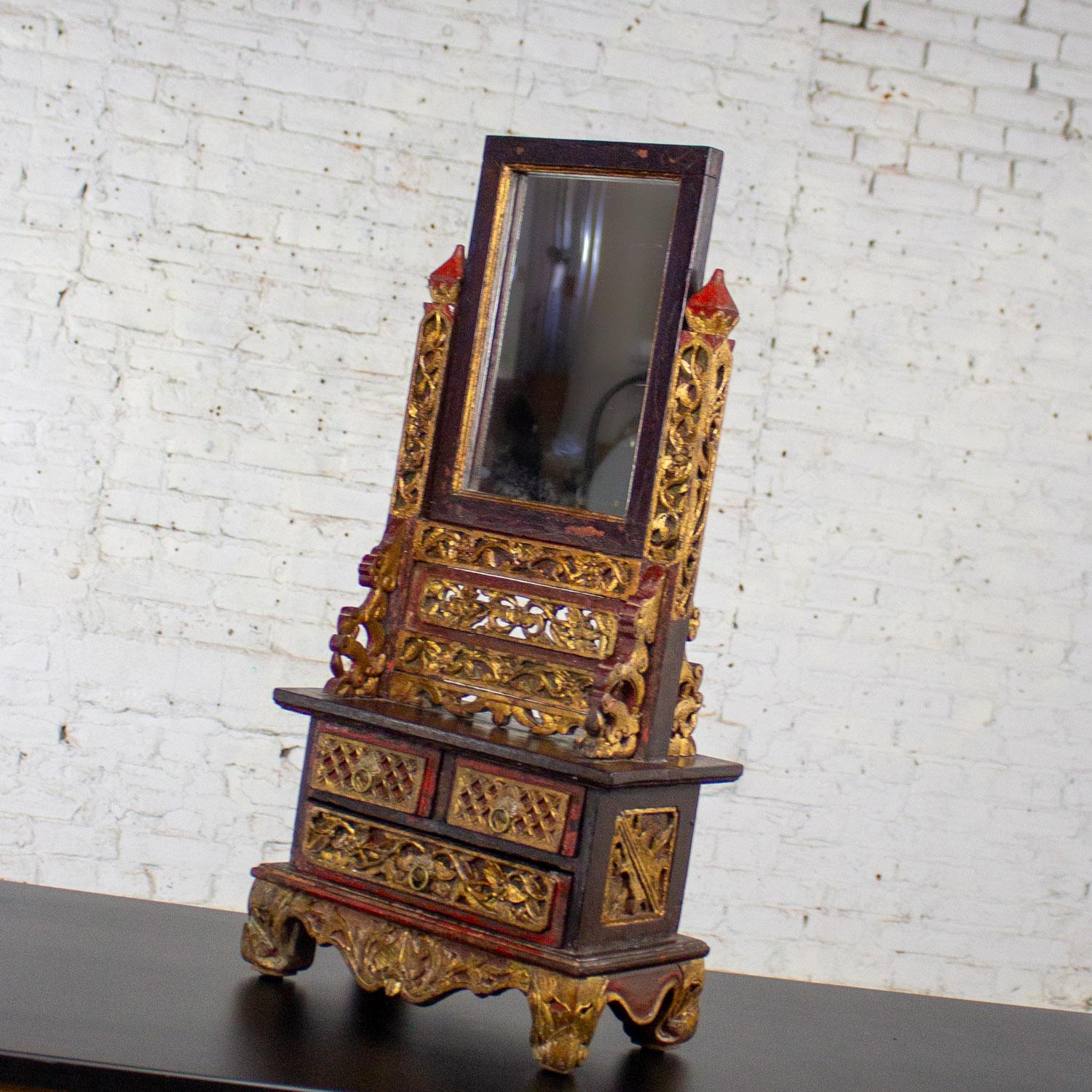 Magnífico joyero de sobremesa o espejo de tocador vintage indonesio de Maduran con marco de madera con detalles dorados y pintados. Bonito estado, teniendo en cuenta que es de época y no nuevo, por lo que tendrá signos de uso y desgaste aunque haya