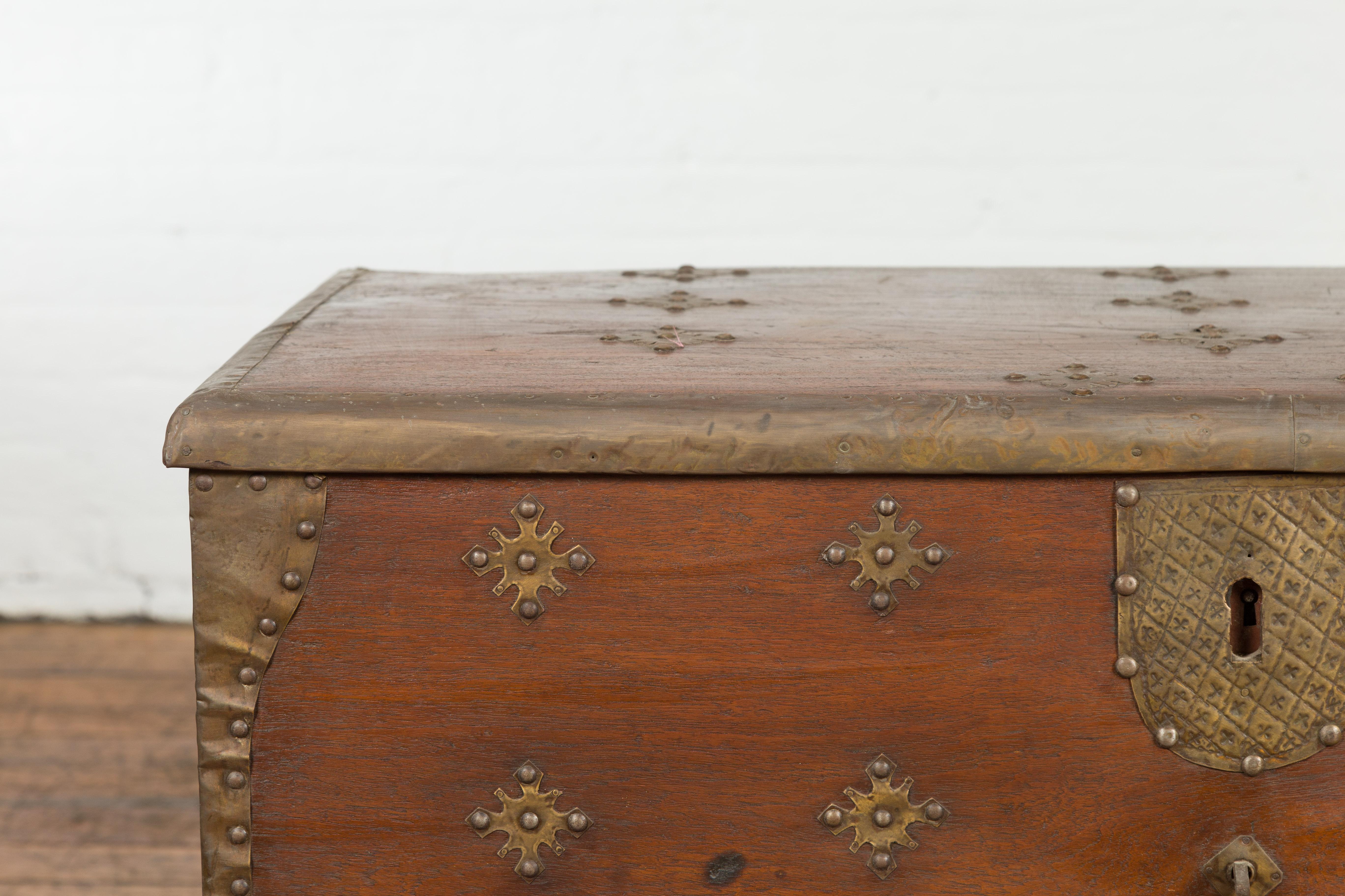 20th Century Vintage Indonesian Wooden Blanket Chest with Ornate Brass Star Shaped Motifs