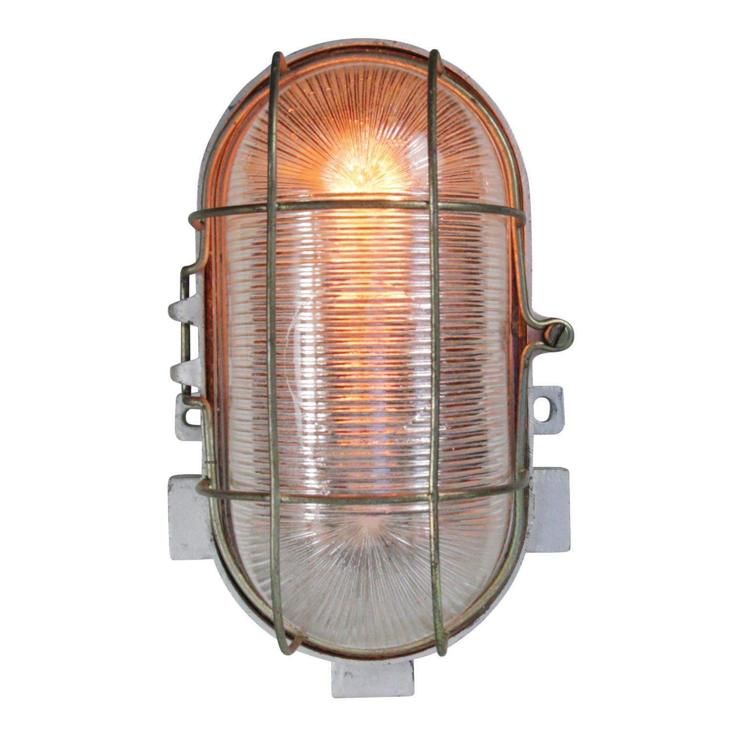 industrial wall or ceiling lamp by RZB Rudolph Zimmerman Bamberg Leuchten
cast aluminum, striped glass

Weight: 0.90 kg / 2 lb

Priced per individual item. All lamps have been made suitable by international standards for incandescent light