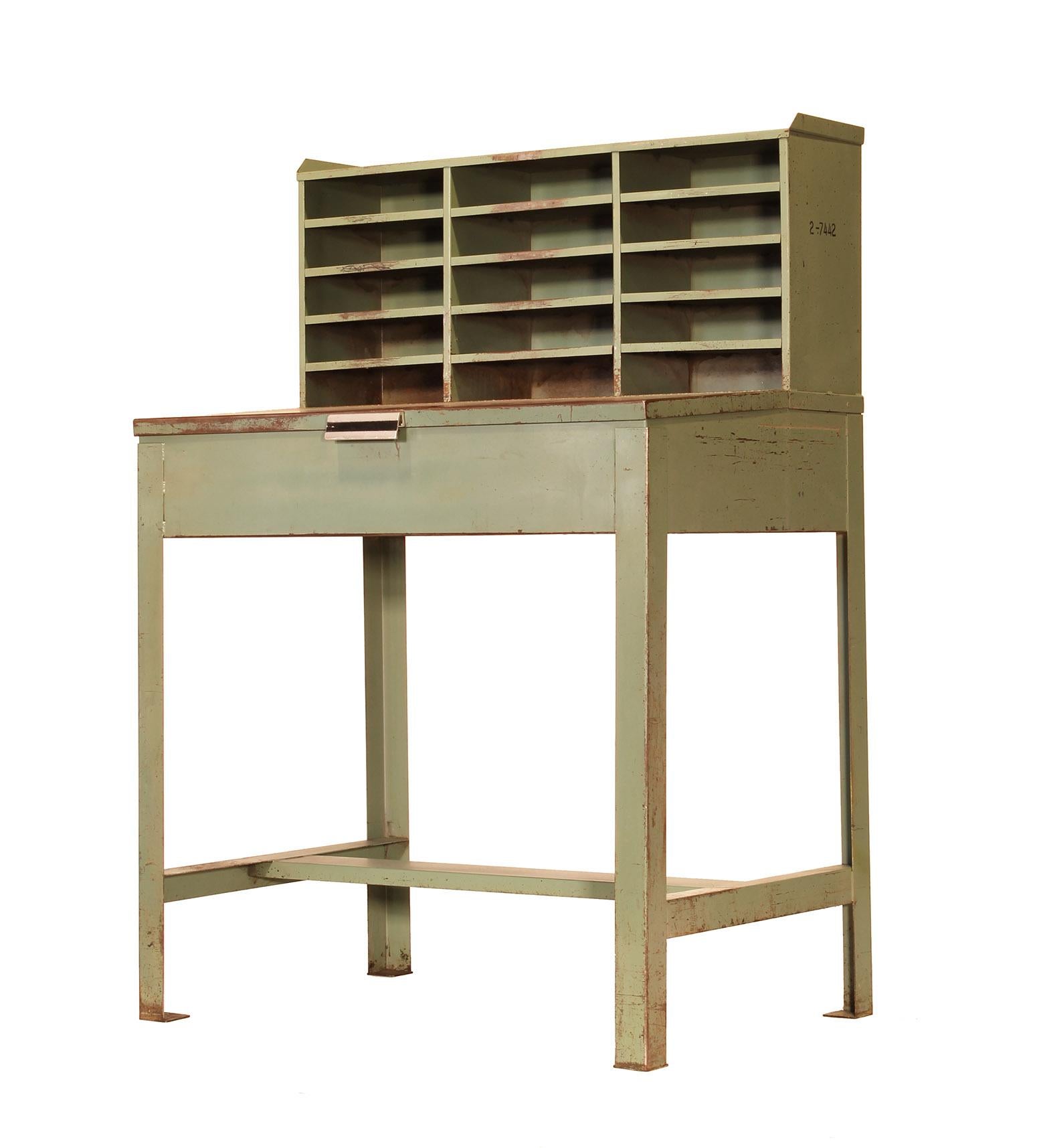 Authentic vintage Industrial distressed shop factory metal / steel foreman's work / mail sorting or postal desk / table. Fully functional with 15 cubby holes for storage, wear commensurate with age. Aluminum handle. Inside drawer features some