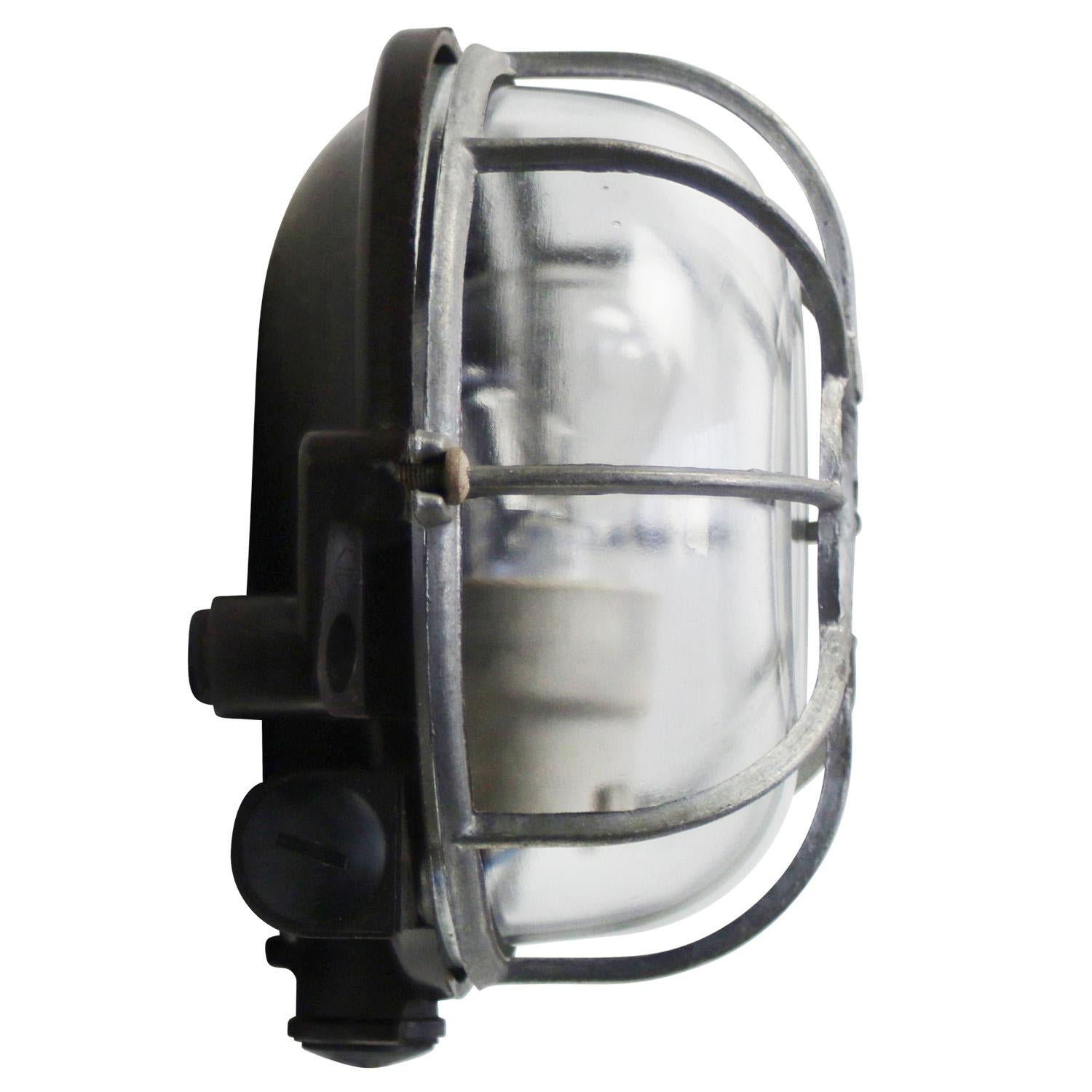 French Vintage Industrial Bakelite Clear Glass Scones Wall Lights For Sale