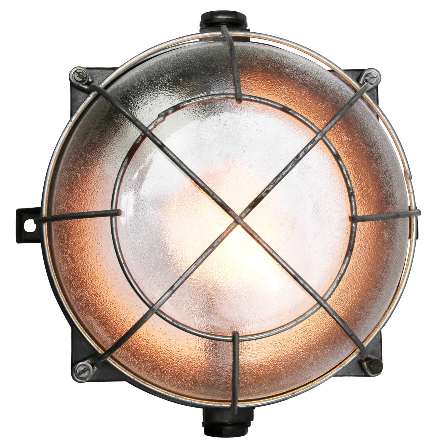 Industrial wall and ceiling scone. Bakelite back. Frosted glass.
Metal frame.

Weight: 1.60 kg / 3.5 lb

Priced per individual item. All lamps have been made suitable by international standards for incandescent light bulbs, energy-efficient and