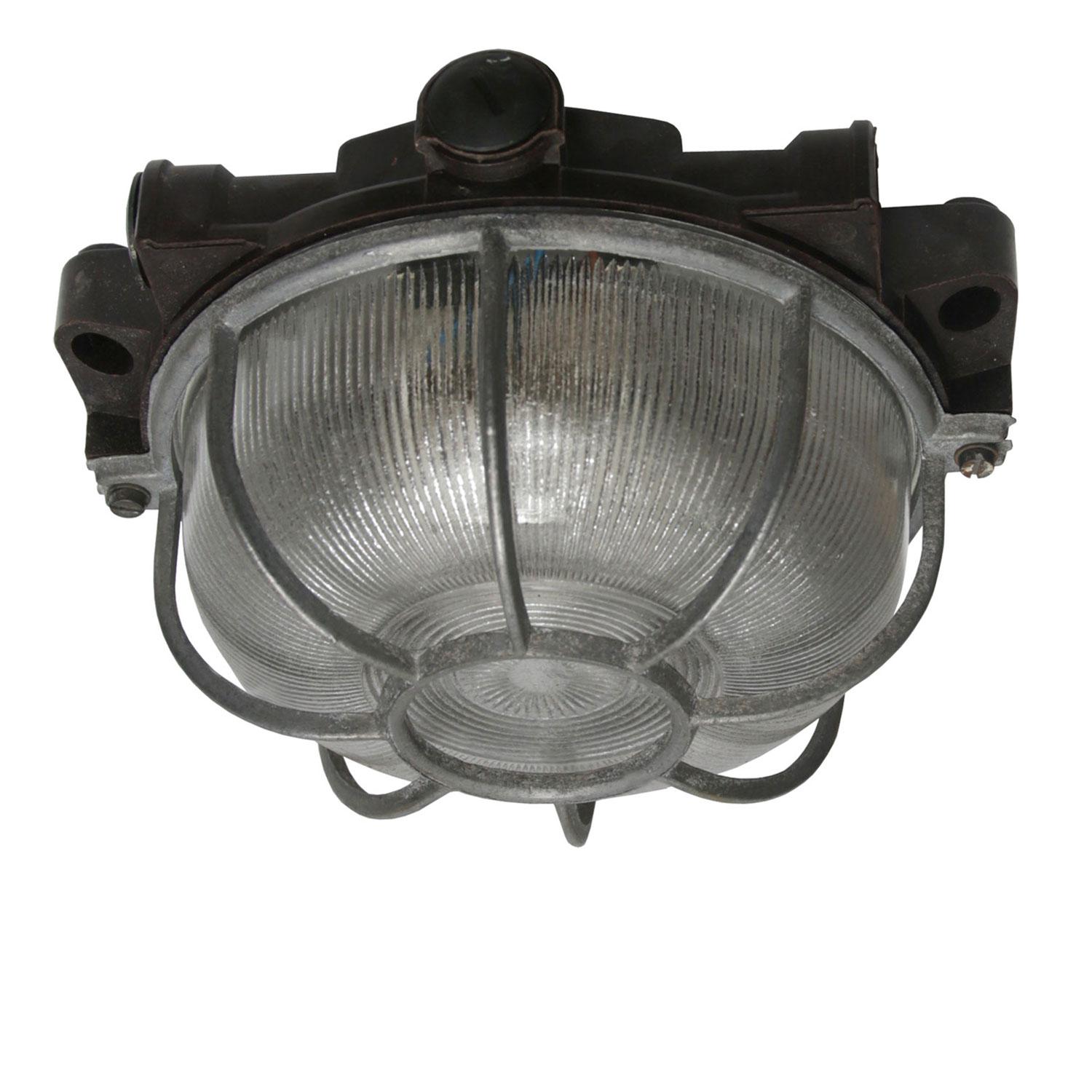Industrial wall and ceiling scone. Bakelite back. Holophane striped glass.
Aluminium frame.

Measure: Weight 1.0 kg / 2.2 lb

Priced individual item. All lamps have been made suitable by international standards for incandescent light bulbs,
