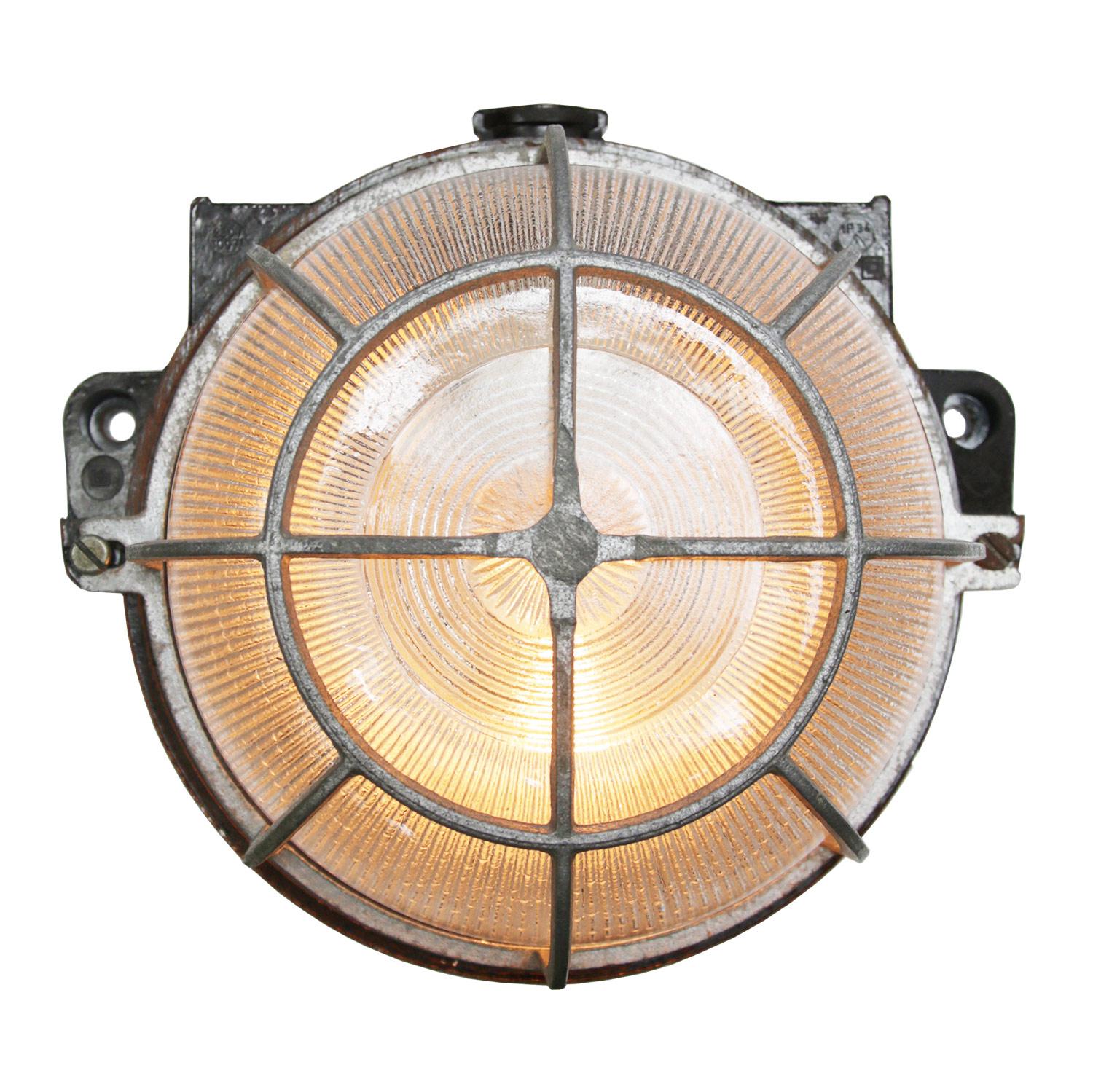 Industrial scones and ceiling flush mount lights. Bakelite base. Holophane striped glass.
Aluminum frame.

Weight 1.0 kg / 2.2 lb

Priced per individual item. All lamps have been made suitable by international standards for incandescent light