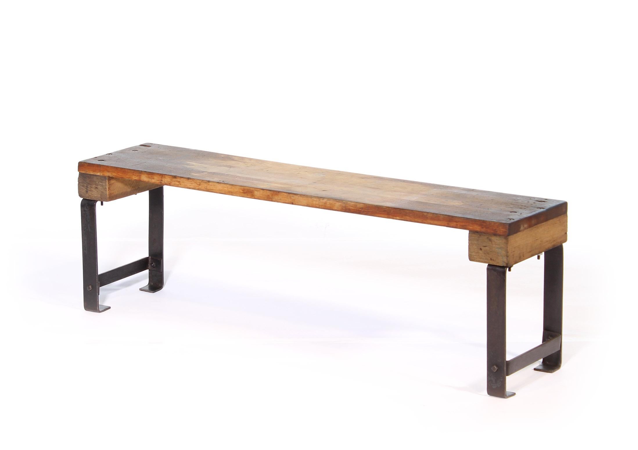 Vintage industrial bench, wood and steel with maple top and blocks form this utilitarian and simple factory style industrial bench or coffee table. Maple top measures 1 1/8