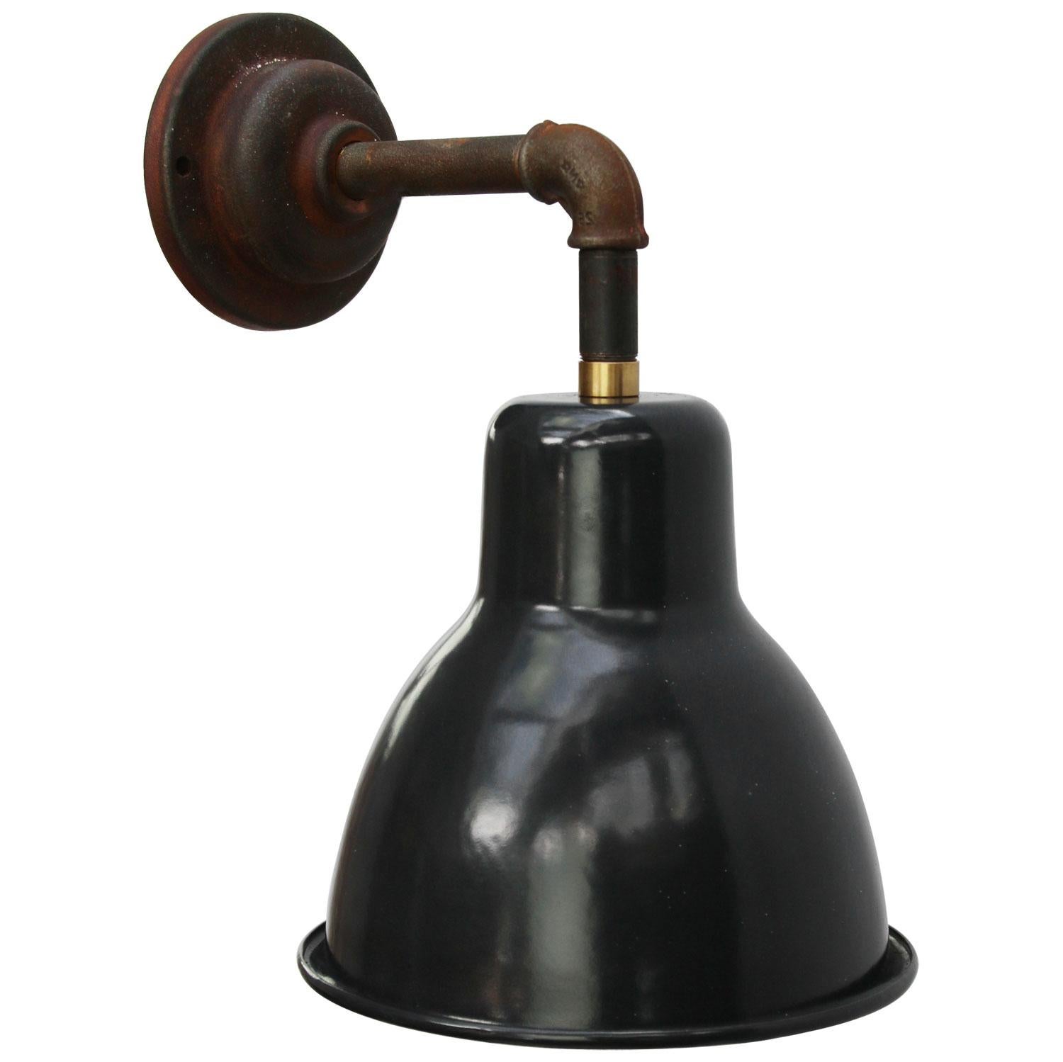 Factory wall light.
Black enamel shade, cast iron arm and wall plate

Diameter cast iron wall piece: 10 cm, 2 holes to secure

Weight: 1.80 kg / 4 lb

Priced per individual item. All lamps have been made suitable by international standards