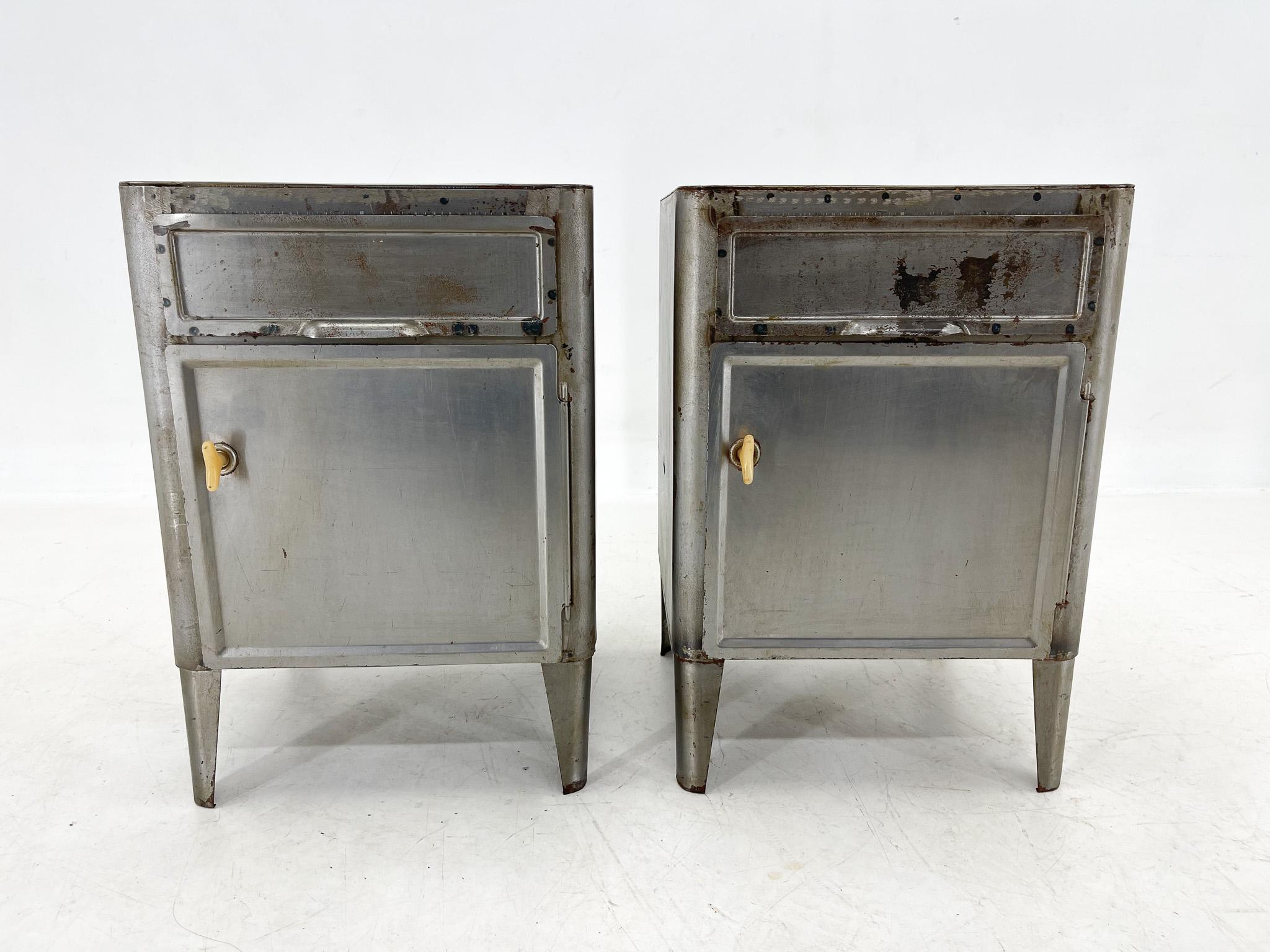 Pair of two unique metal nightstands from the 1920's. Brushed and cleaned. 