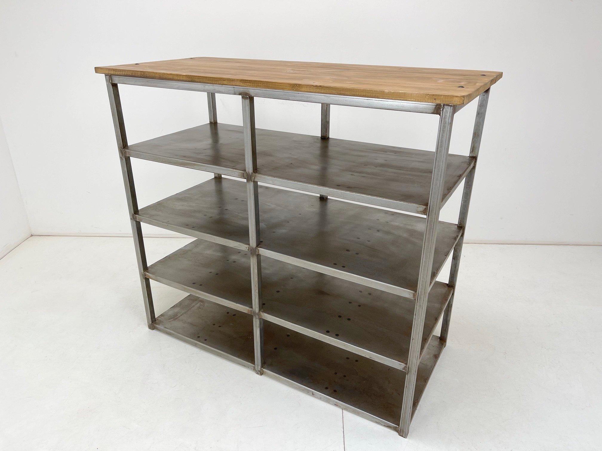 Vintage Industrial Shelf rack made of brushed steel and wood. The top wooden part was sanded and waxed.