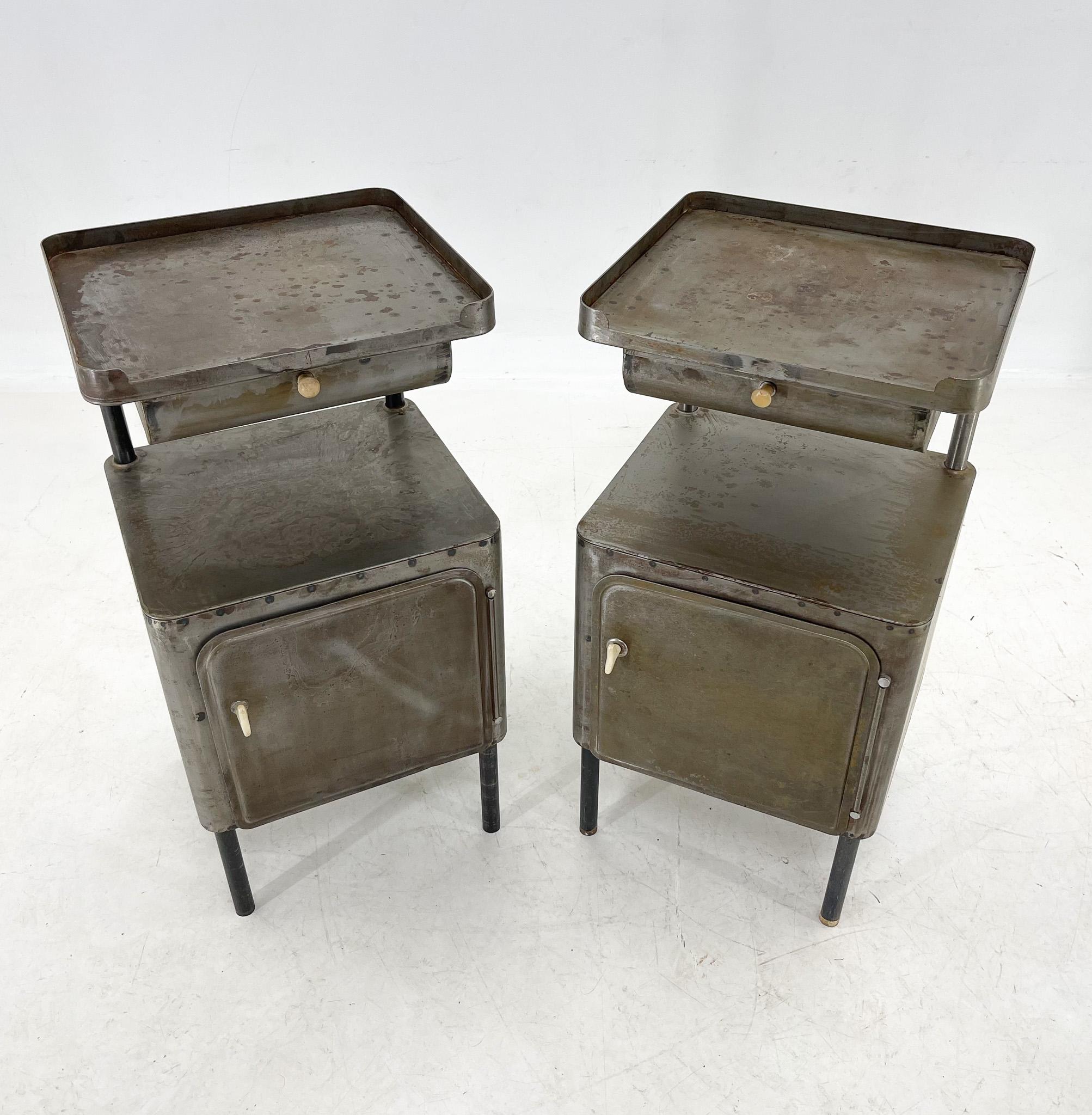 Pair of two unique metal nightstands from the 1920's. Brushed and cleaned.