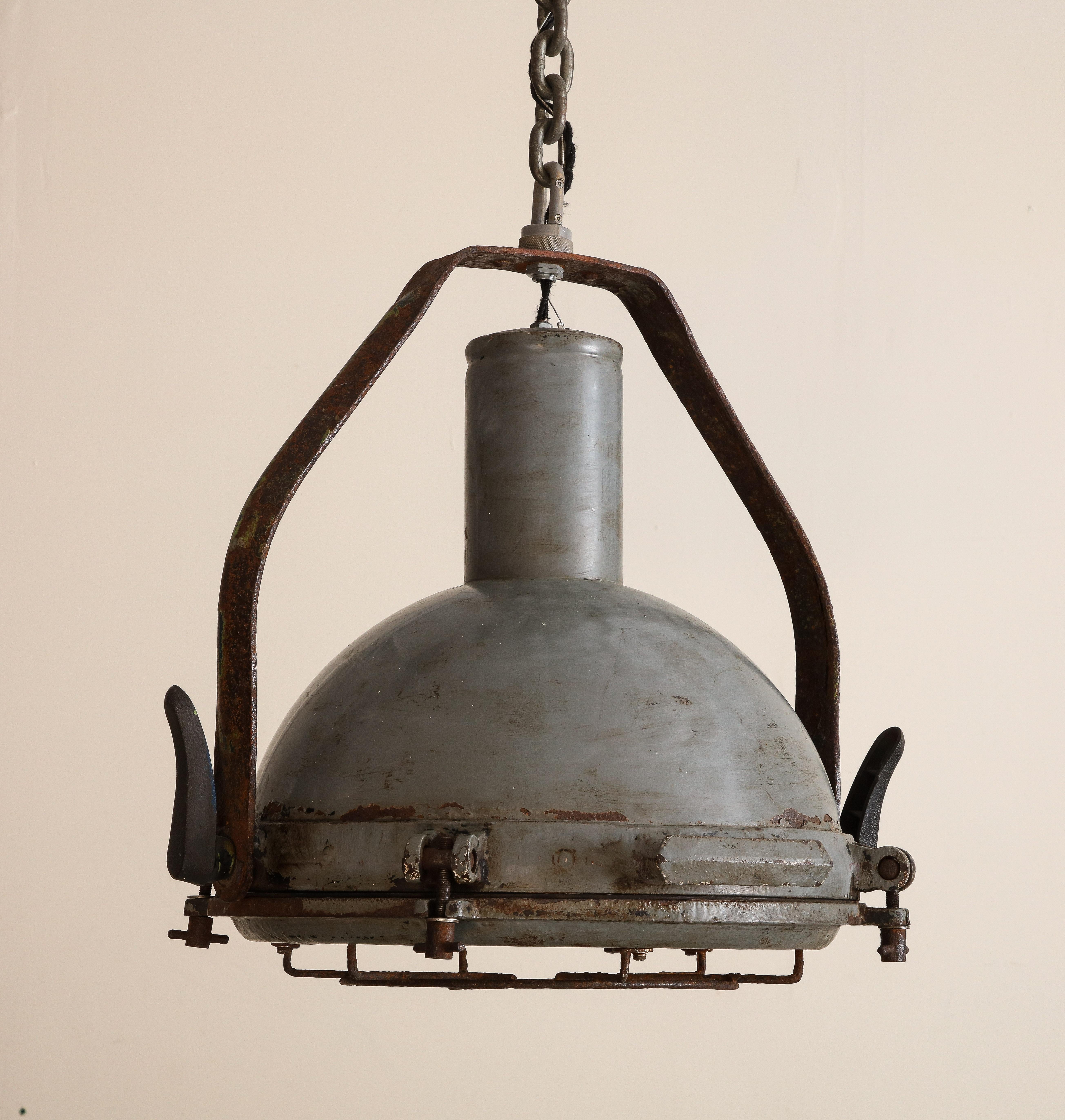 Vintage industrial cast iron cage pendant light, c. 1950. Rust/patina as shown, wired for USA and in working condition. 

19