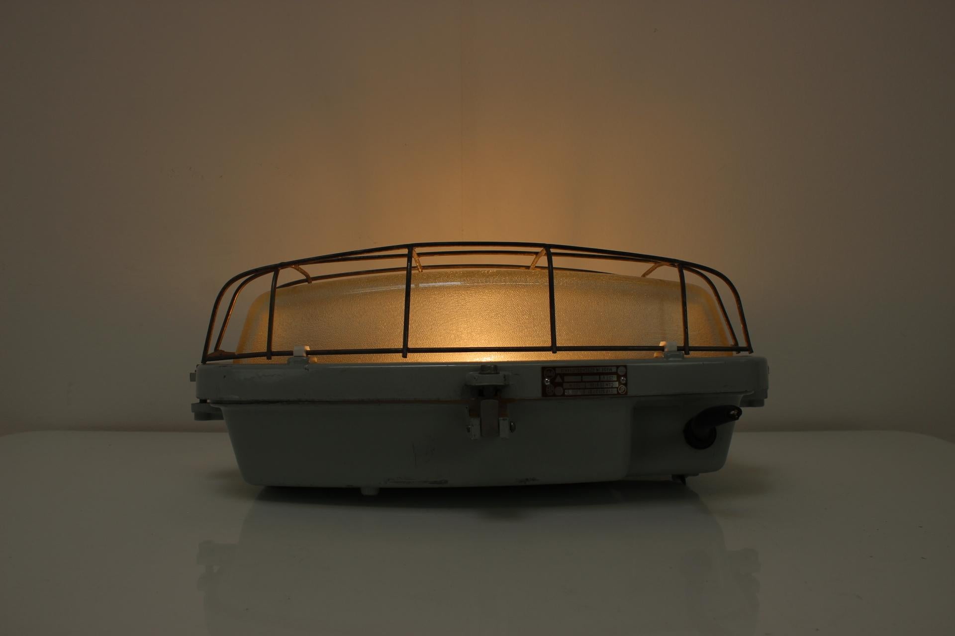 Vintage Industrial Ceiling Lamp Typ 511 32 01, made in Czechoslovakia, in the 1960's.
Made of metal and glass.
Repolished, cleaned, shows signs of use.
Fully funcitonal.