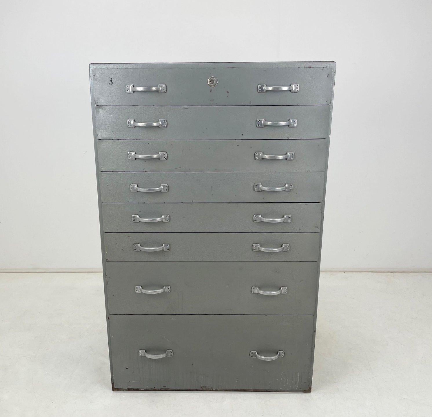 Heavy industrial chest of drawers made of metal. Rescued from a screw factory in former Czechoslovakia. 