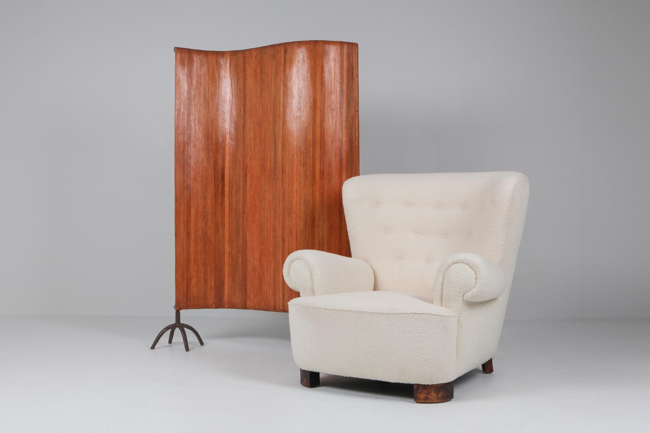 Unusual 'wavey' room divider in an Arts & Crafts meets Brutalist style.
Mahogany and iron

We have three pieces available.

In one of the images you see the piece presented next to a Flemming Lassen Scandinavian Modern bergère.
      