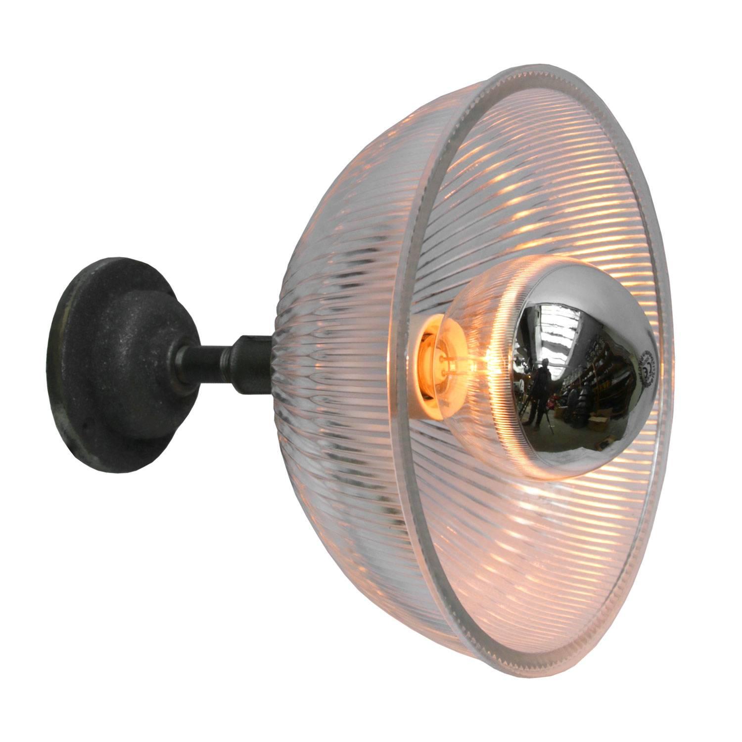 Holophane glass wall light
metal E27 / E26 bulb holder with clear striped glass shade

cast iron wall mount diameter 10.5 cm / 4”
wall lamp / ceiling Sconce

Weight: 2.3 kg / 5.1 lb

Priced per individual item. All lamps have been made suitable by