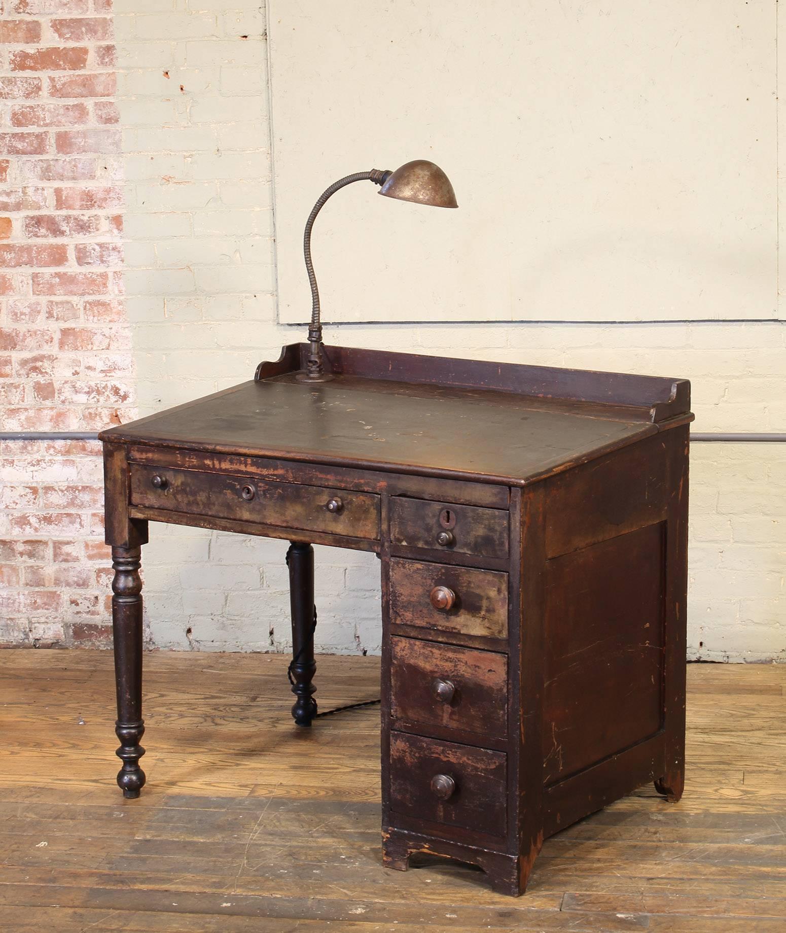 Vintage Industrial Clerk's Desk with Adjustable Task-Light In Distressed Condition In Oakville, CT