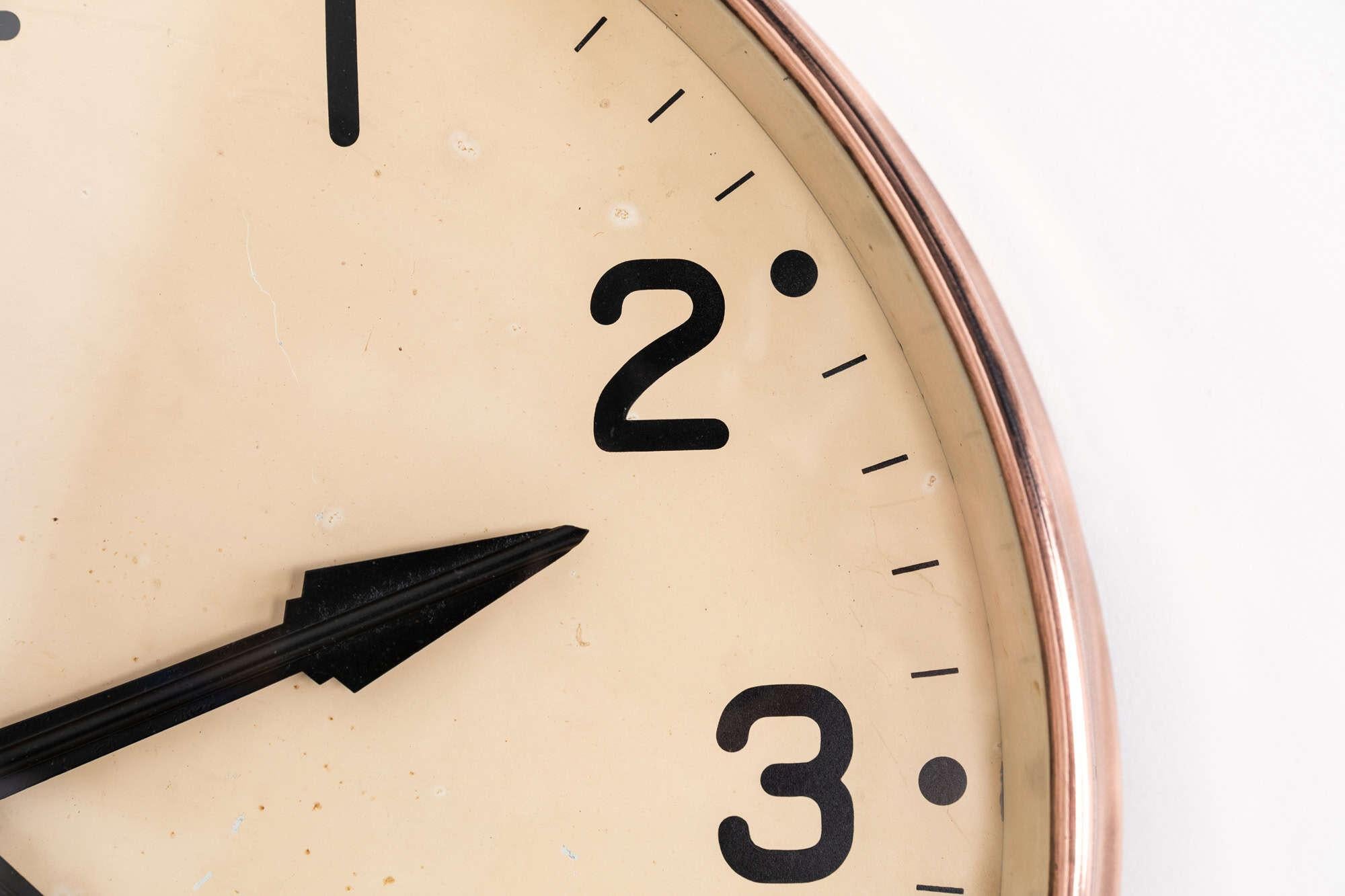 

Beautiful example of the iconic wall clock made in England by renowned electrical manufactures Gents of Leicester. c.1930

The metal casing has been stripped of paint to show the elegant copper beneath. The 18