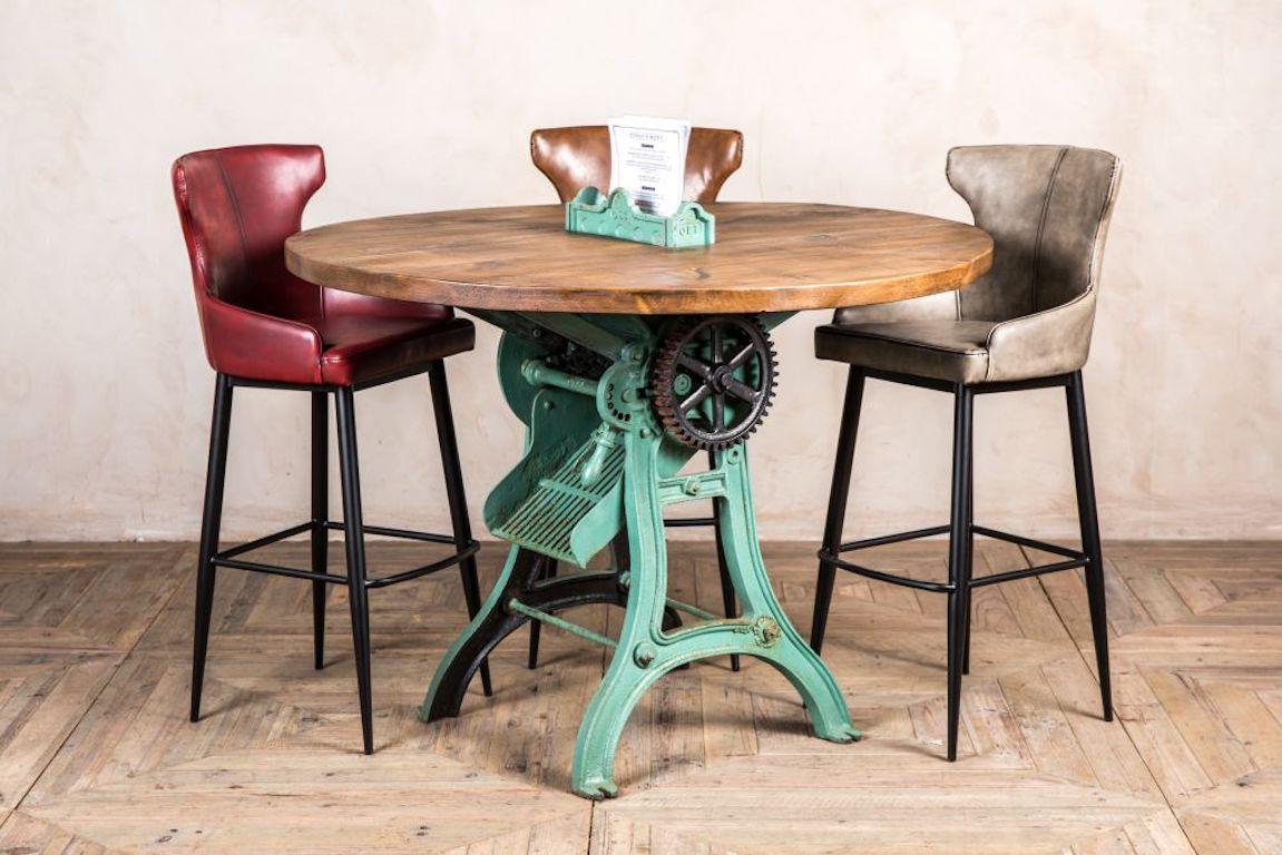 A fine vintage Industrial cutter table, 20th century. 

Yes, you guessed it from the title, this vintage Industrial cutter table has all the characteristics of a mango cutter, which you can see is used as the base of the table, with a large chunk