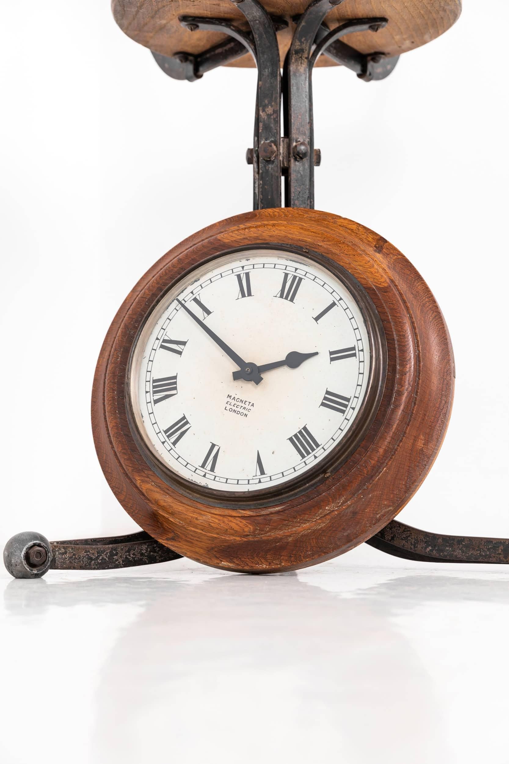 

A beautiful and diminutive wall clock made in England by Magneta Electric. c.1930

This lovely little clock has been left in original condition, with age related patina to the dial and hardwood case. Converted to a high torque Quartz movement for