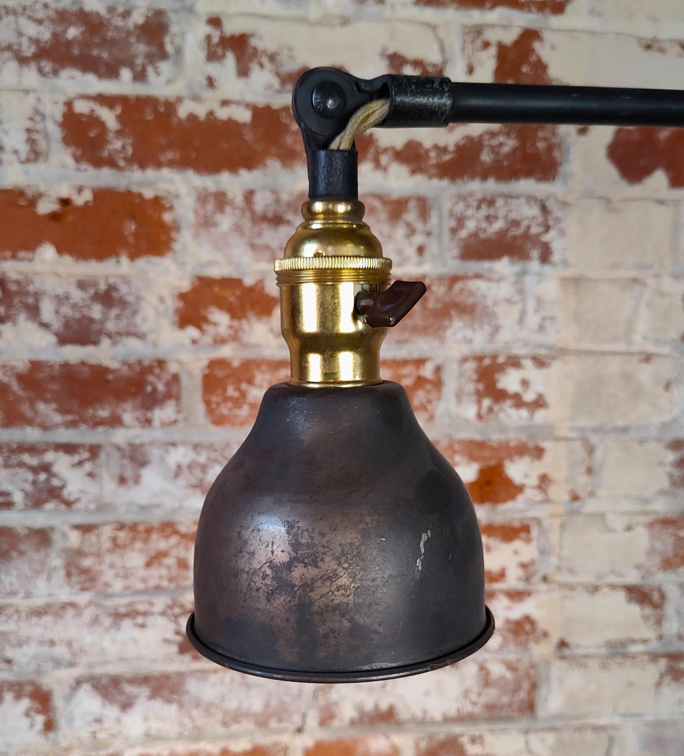 Vintage Industrial Double Arm Articulating Floor Lamp with Solid Base For Sale 5