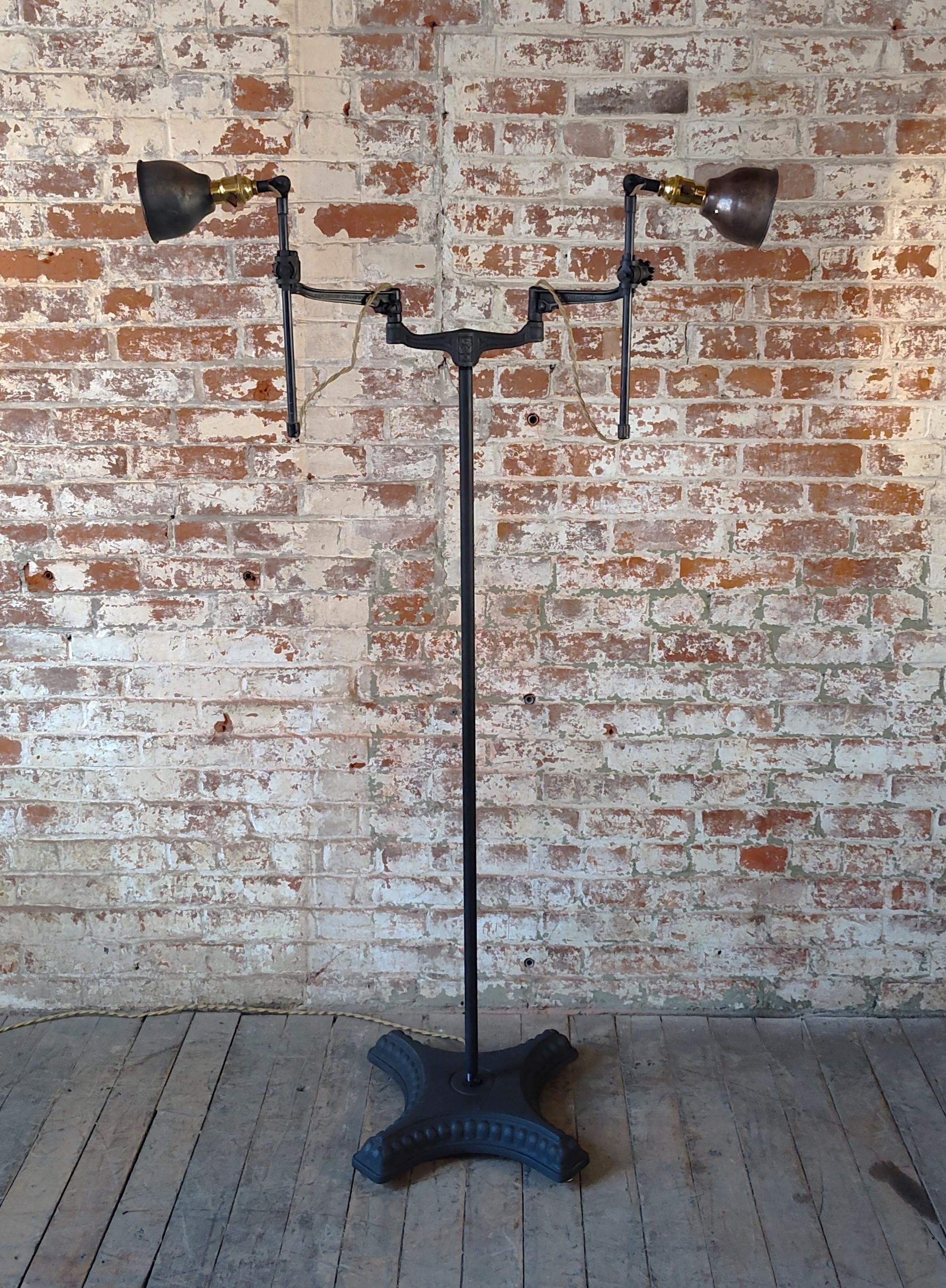 Vintage Industrial Double Arm Articulating Floor Lamp with Solid Base In Good Condition For Sale In Oakville, CT