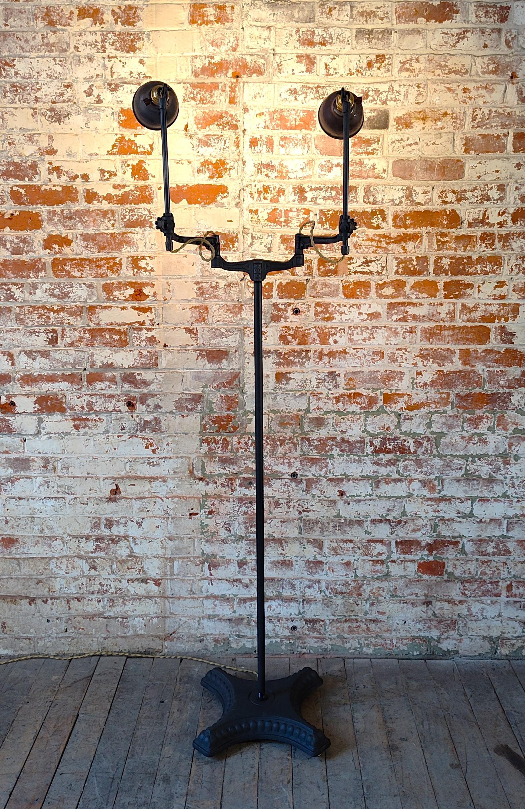 20th Century Vintage Industrial Double Arm Articulating Floor Lamp with Solid Base For Sale