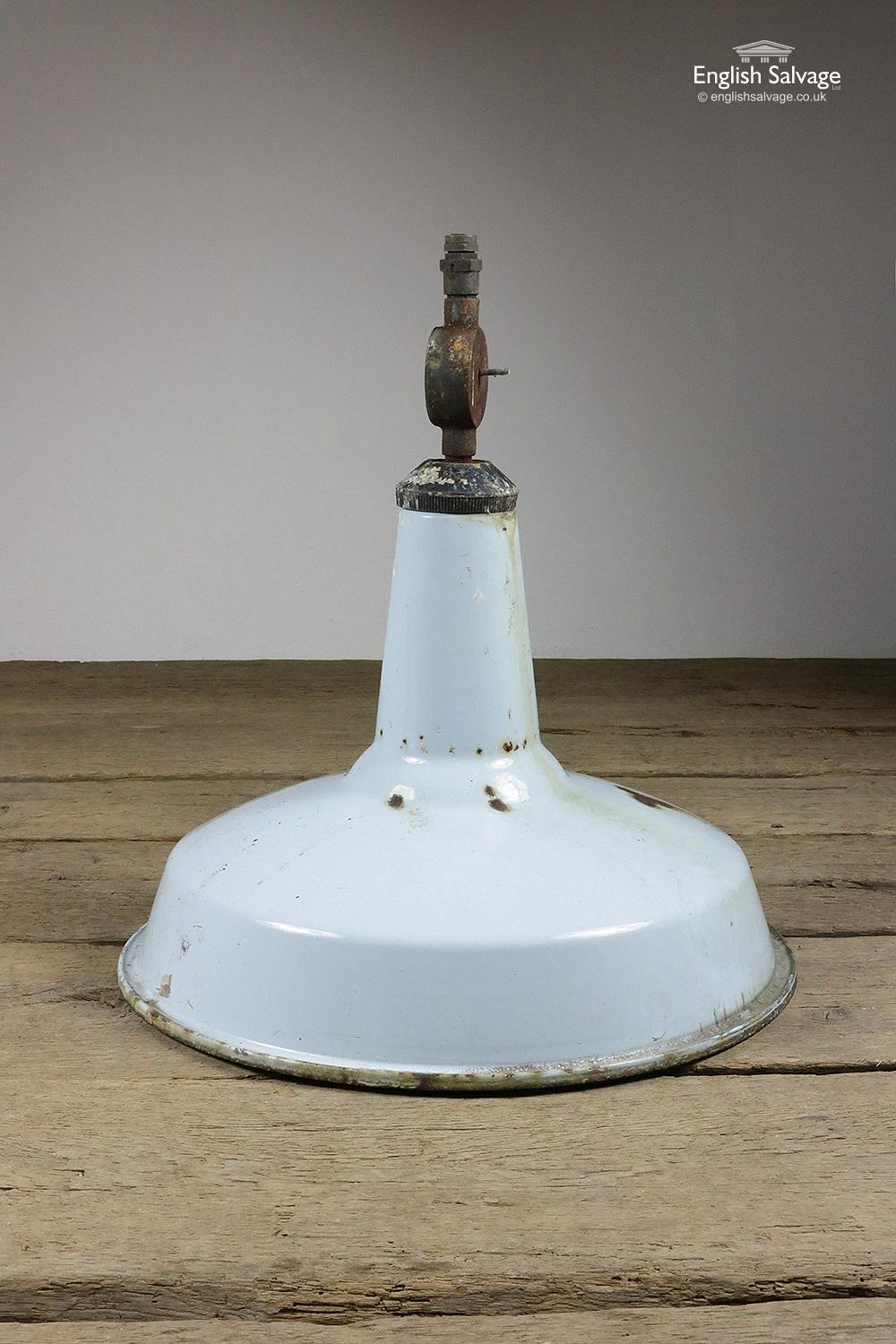 Reclaimed vintage industrial enamel pendant light which needs rewiring. Several spots of rust on the inside and outside of the shade. 

All electrical work/installation must be undertaken by a qualified electrician.