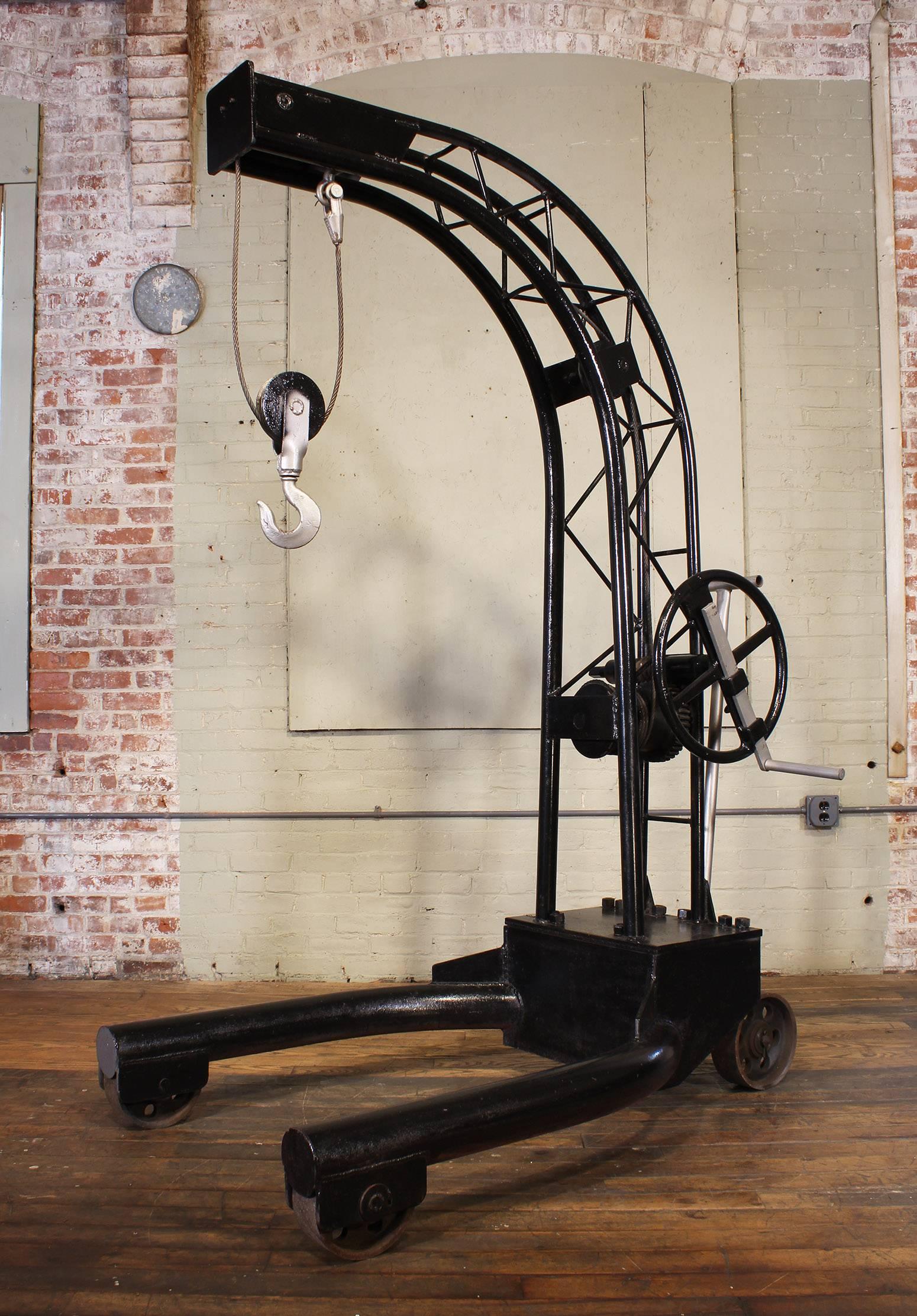 Vintage crank engine truss hoist made by the Hill Acme Company Cleveland Ohio. Reads 