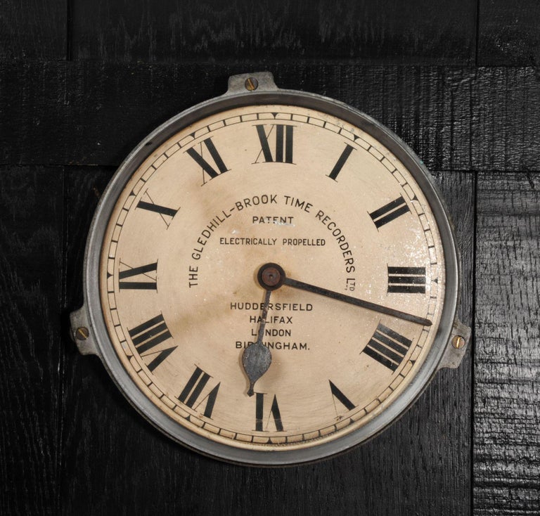A lovely painted dial by the Gledhill-Brook company. Recovered from an industrial building it has scars of its hard working life with glorious original flaky paint and old rust. The original heavy cast iron frame hangs on the wall and supports the