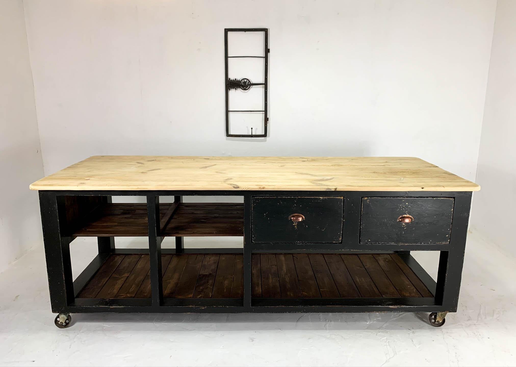 Authentic Baker's table made in England during the 1940s. Rescued from a barn in North Yorkshire and now fully restored to make a practical kitchen island or work table in the home, retail or restaurant setting.
It features two large drawers with