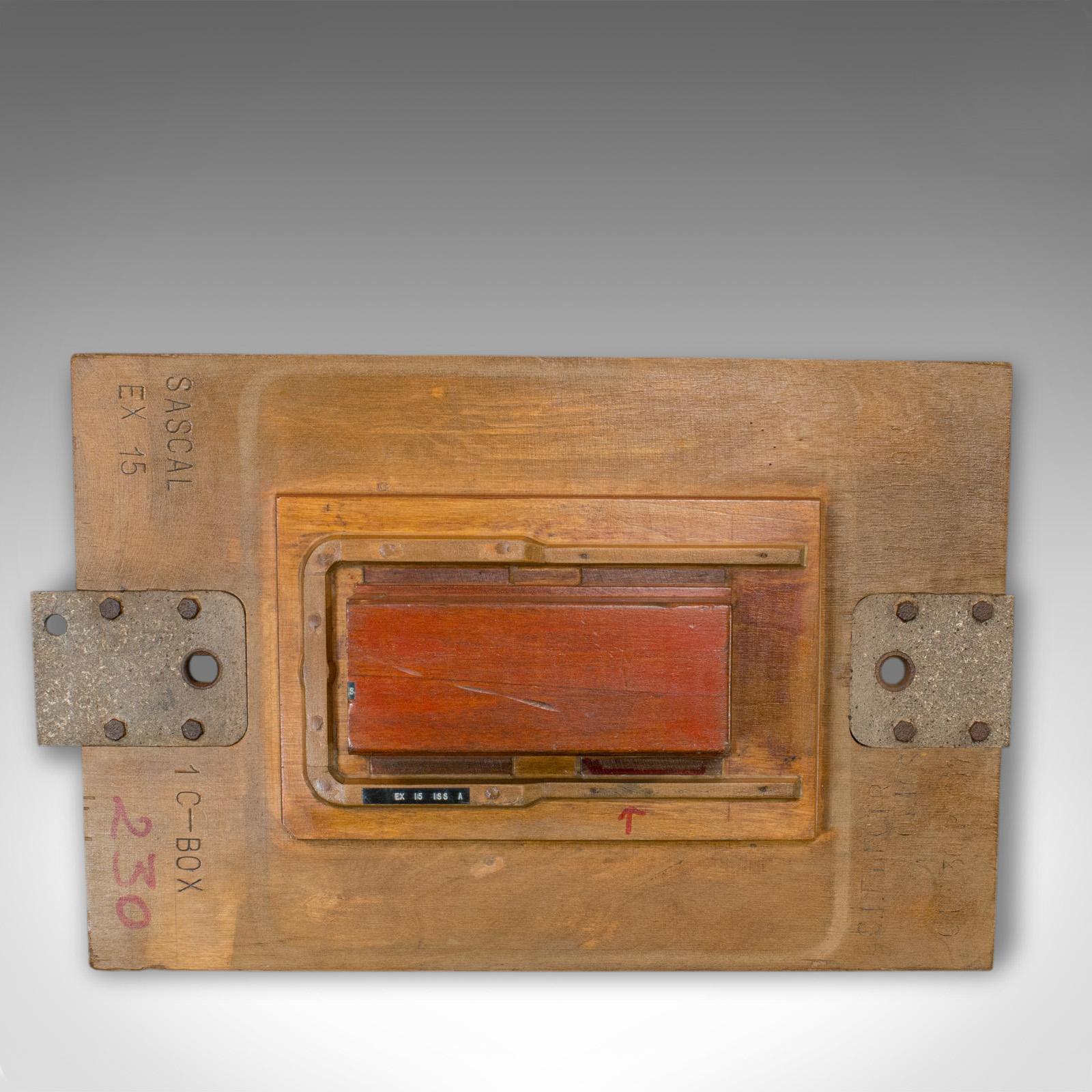 This is a vintage industrial factory mould. An English, mahogany decorative wall-hanging pattern, dating to the mid-late 20th century.

Strong industrial taste and unusual decorative form
Displays a desirable aged patina
Flat rear suitable for