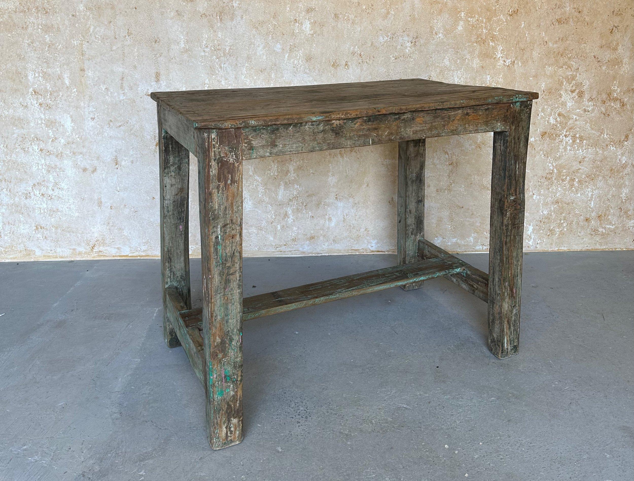 This vintage French work table is a wonderful and rare find that would make an excellent addition to any home or workspace. Made from solid teak and measuring 36 inches in height and 44 inches in width, with a depth of  26 inches, this table is