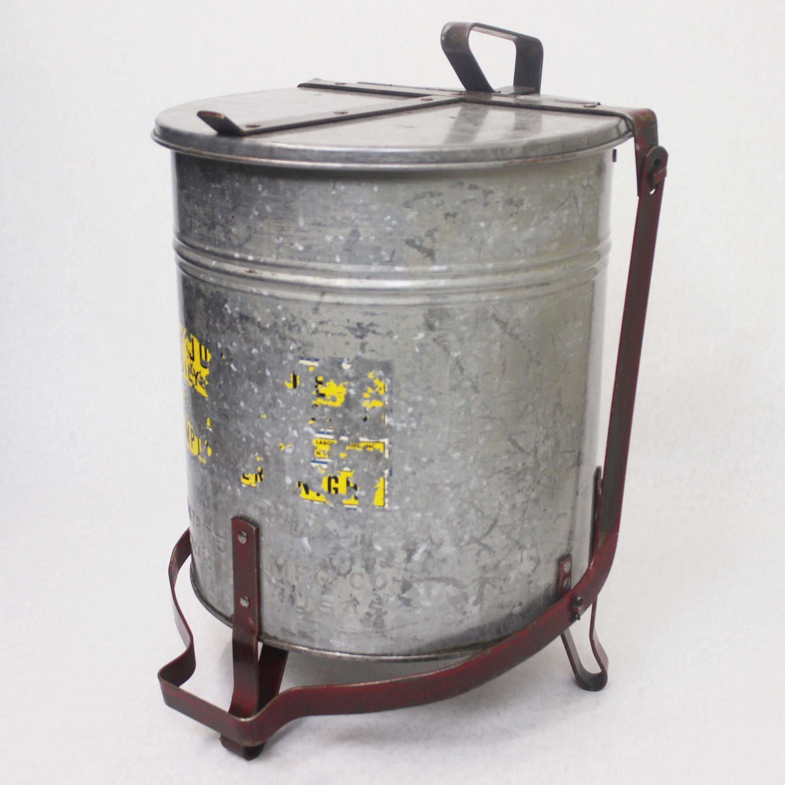 This great little waste basket features a galvanized steel pale with articulated foot-operated lid. pale is stamped 