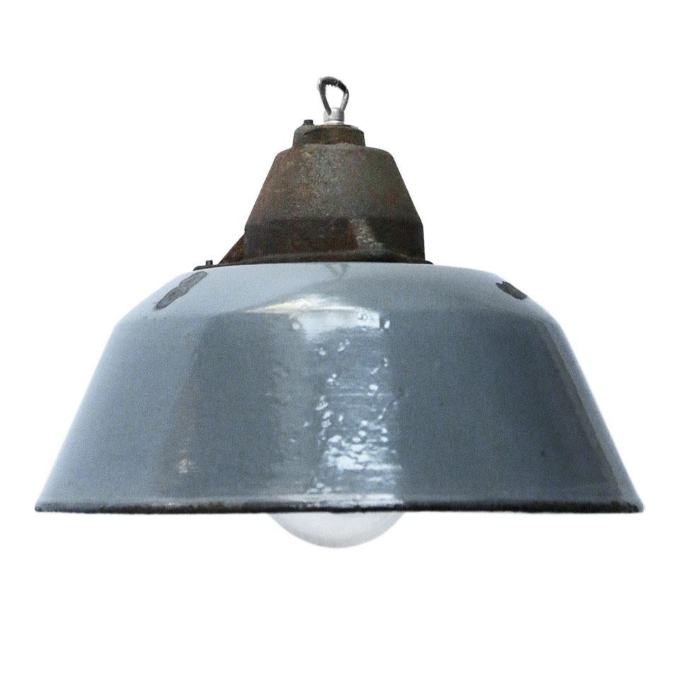 Factory pendant. Gray blue enamel white interior. Cast iron top with clear glass.

Measures: Weight 3.4 kg / 7.5 lb

Priced per individual item. All lamps have been made suitable by international standards for incandescent light bulbs,