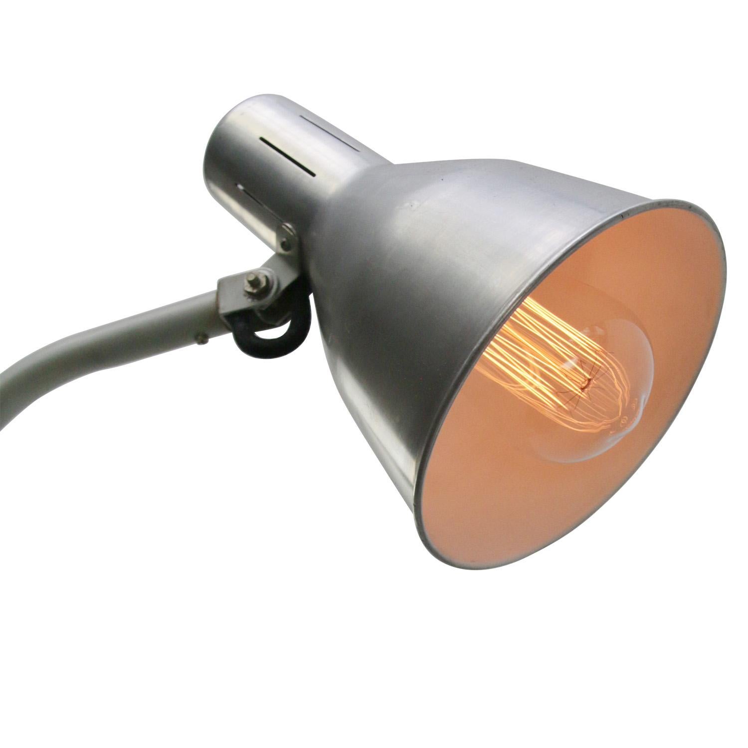 Grey metal industrial 2 arm work light by Hala, Zeist, The Netherlands. Design H. Busquet.
adjustable in height and angle
including plug and switch

E27 / E26

Weight: 1.90 kg / 4.2 lb

Priced per individual item. All lamps have been made